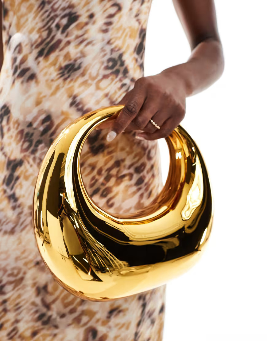 ASOS DESIGN hardcase scoop clutch in gold | ASOS (Global)