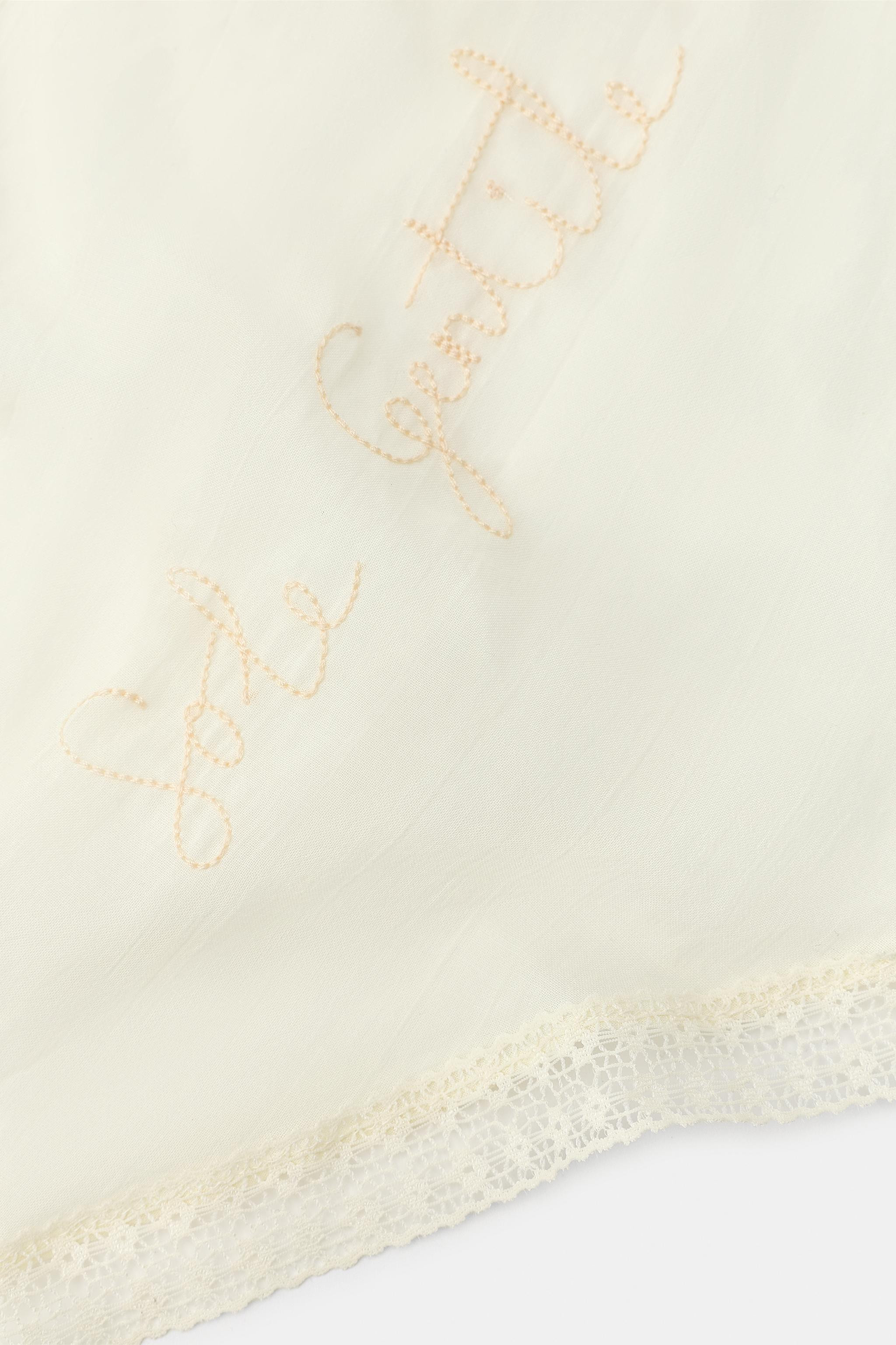 Model height: 181 cmBandana-style scarf crafted from 100% cotton yarn. Featuring embroidery detai... | Zara DE