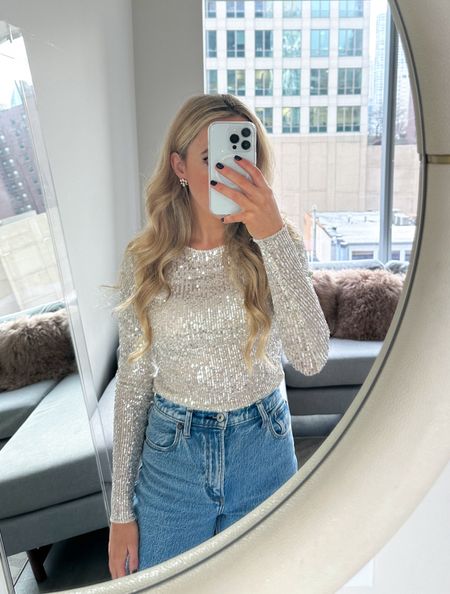 holiday party outfit
- rounded up sequin party tops at every price point 

Wearing medium wash in jeans:

Christmas party, winter bride outfit, NYE top, sequin top, New Year’s Eve, going out outfitt, engagement shoot inspoired

#LTKHoliday #LTKwedding #LTKparties