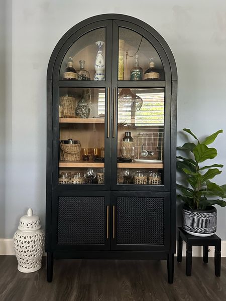 Arched cabinet we made into our bar for downstairs. We had a bar upstairs in our theater room but entertain downstairs more and now found this cabinet locallyt❤️ styled with my Serena and Lilly items and some other glassware #bar #serenaandlilly #archedcabinet #whiskey #glassware #barware #entertain 

#LTKGiftGuide #LTKstyletip #LTKhome