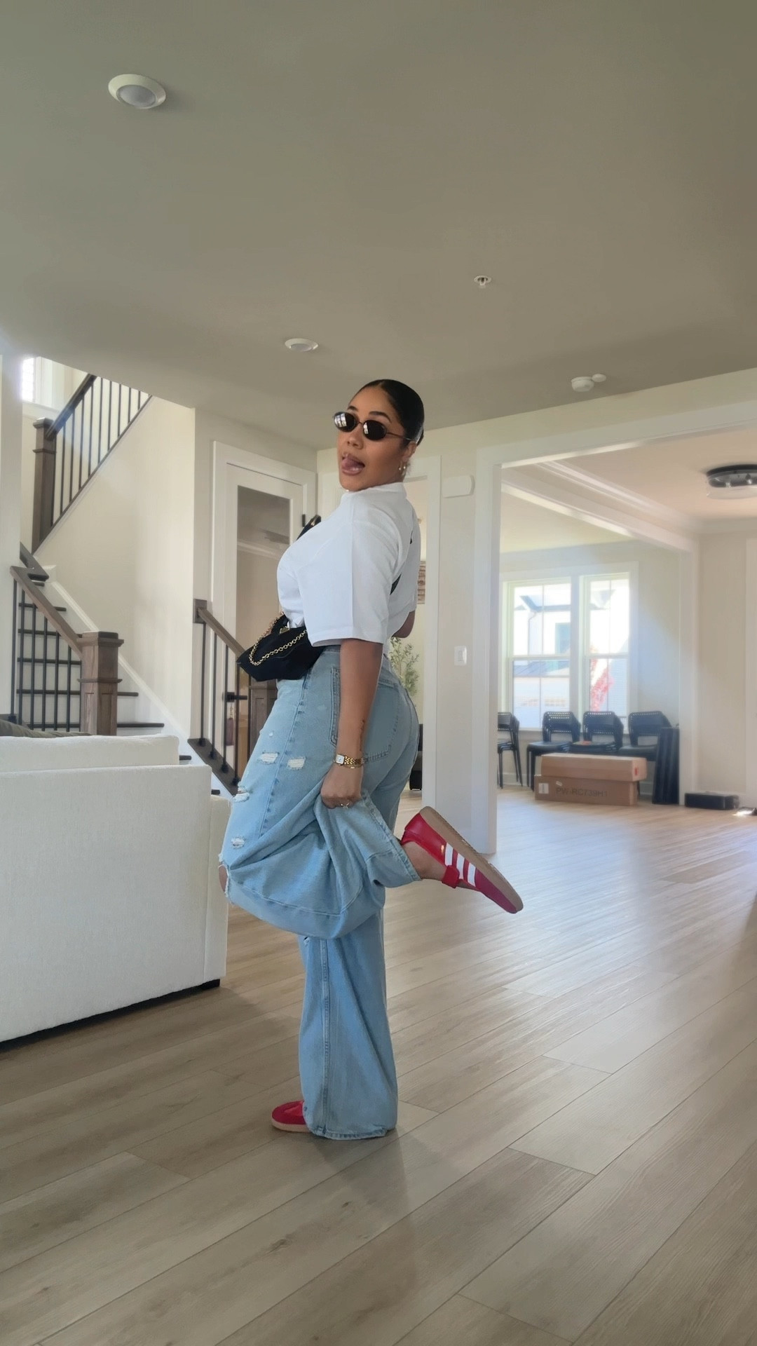 Red samba mary janes outfit idea ❤️ Styled these adidas samba mary janes with wide leg ripped jeans and a cropped white tee for an easy everyday look that still feels put together. This is the perfect casual chic outfit for spring and summer, especially if you love mixing sporty sneakers with feminine touches.

Added slightly bigger hoop earrings (a big deal for me 😅), a mini prada bag, and dark tortoise shell sunglasses to elevate the look without doing too much. These samba mary janes are so comfortable and i already know they’re going to be on repeat all season.

If you’ve been wondering how to style samba mary janes or looking for wide leg jeans outfit ideas, this is your sign 🫶🏽

#sambamaryjanes #adidassamba #widelegjeans #springoutfits #summerstyle #casualchic #everydayoutfit #amazonfashion #zaraoutfit #ltkstyle #ltkfinds #momstyle #streetstyle

#LTKSeasonal #LTKgrwm #LTKootd