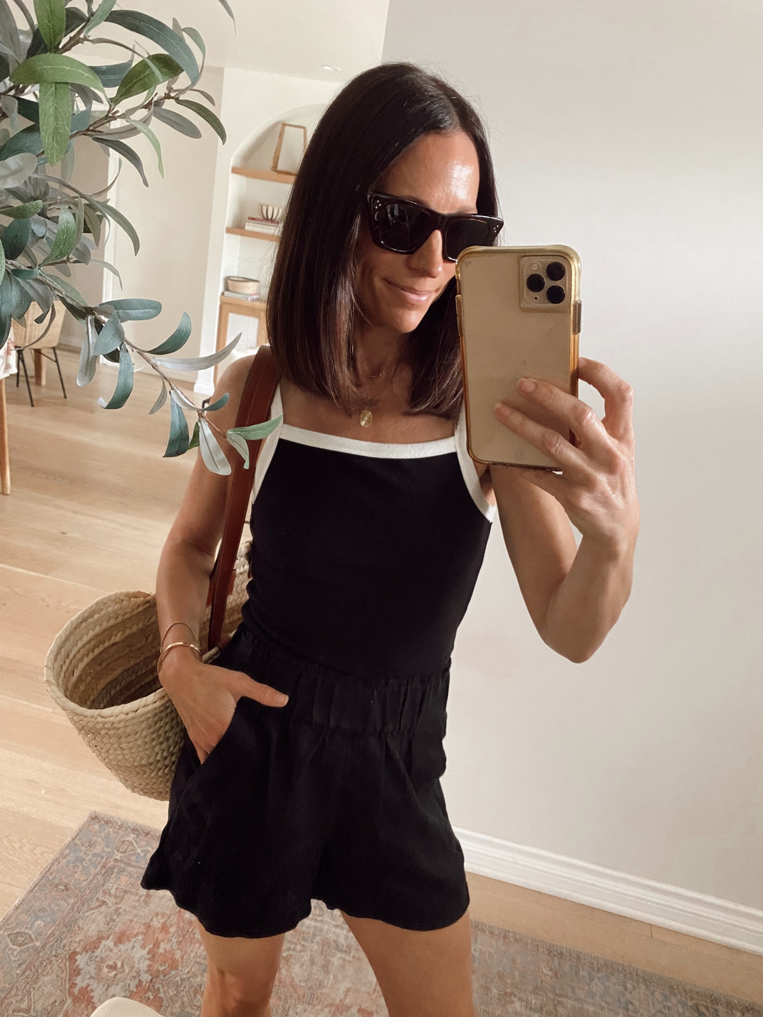 Summer outfit from June’s capsule 
Black and white contrast tank runs small size up
Black linen shorts 

#LTKstyletip