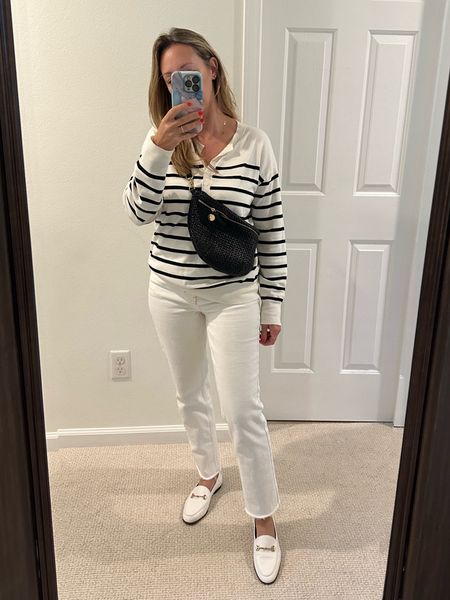 Spring summer transitional outfit such comfortable Henley shirt white jeans and loafers Clare v bag 