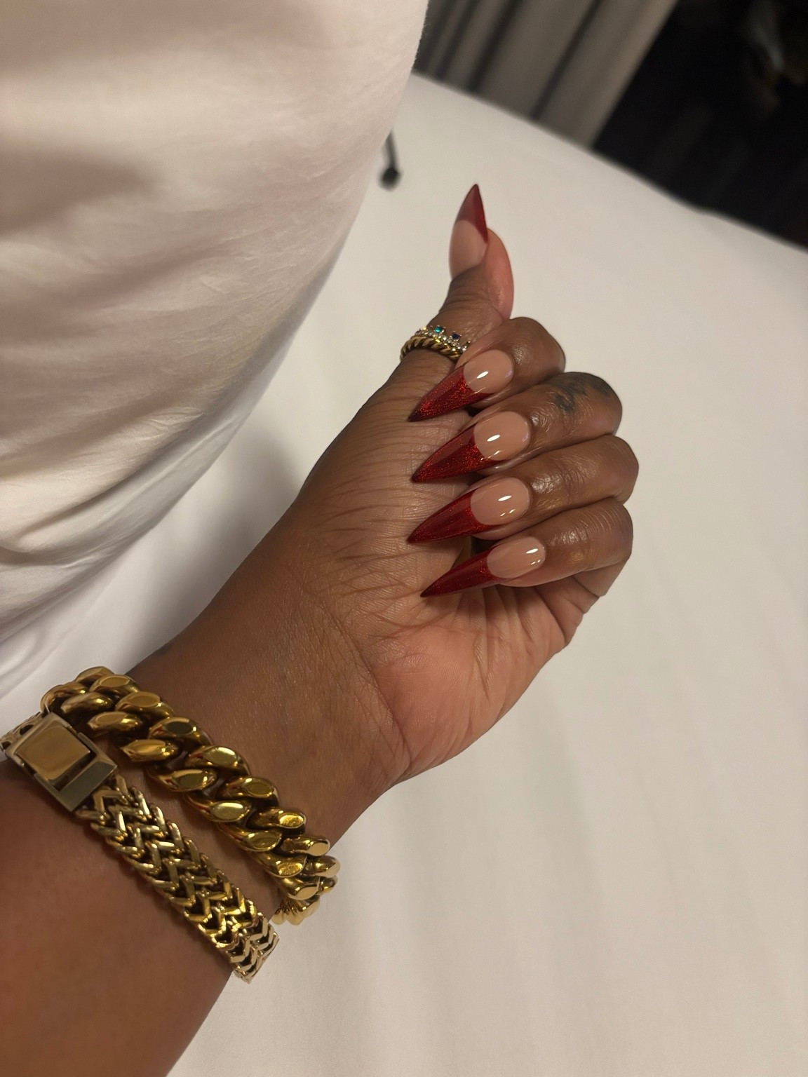 Lately I’ve been realizing it’s really the little details that pull everything together. 

A fresh set, gold jewelry, and a simple neutral look will always make me feel more put together and confident.

Obsessed with these red glitter french tip nails paired with my everyday gold jewelry stack lately. Perfect for date night, vacations, birthdays, brunch, or honestly just romanticizing everyday life a little more.

Linked my jewelry pieces for anyone looking for affordable luxury jewelry, everyday gold bracelets, and stackable pieces that elevate any outfit.