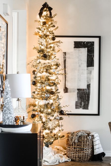 Christmas family room! 9’ Pencil tree in the corner // neutral & metallic Christmas decor 

#LTKunder50 #LTKhome #LTKHoliday
