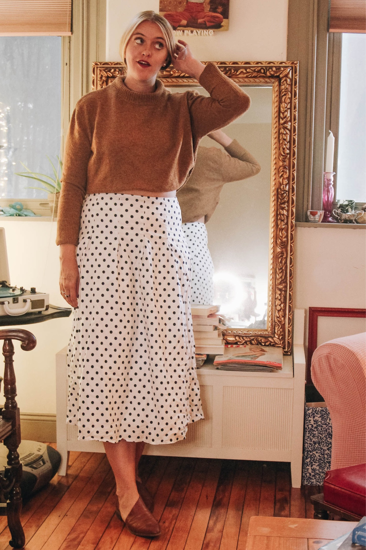 Thanksgiving Dinner Outfit Inspiration: Outfit 4 
rust turtleneck sweater, polka dot skirt, brown pointed booties 

#LTKstyletip #LTKSeasonal #LTKHoliday
