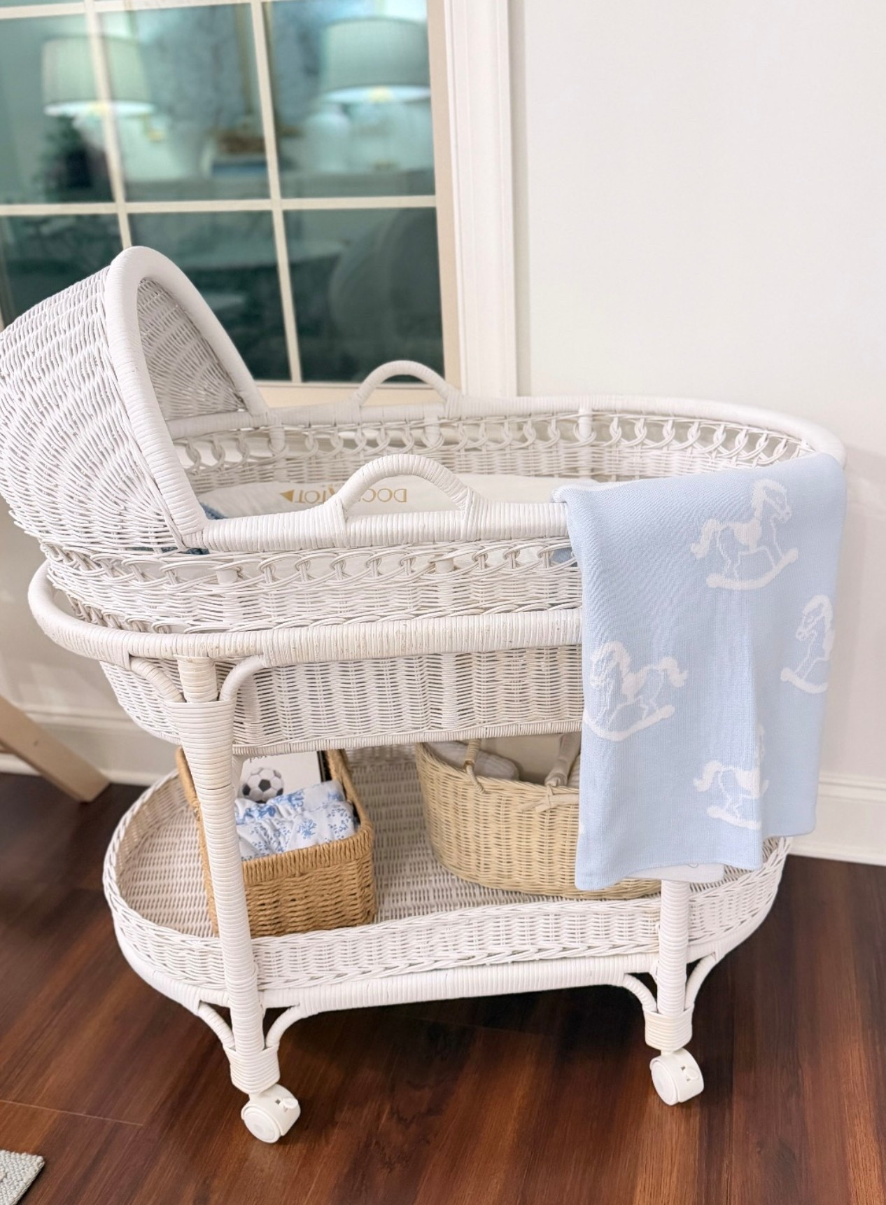 This rolling wicker bassinet has been one of our most used items so far in postpartum + this novelty blanket is the most classic baby boy touch 🥹 so convenient that there’s storage on the bottom for a diaper caddy, etc  

#LTKmomlife #LTKKids #LTKBaby