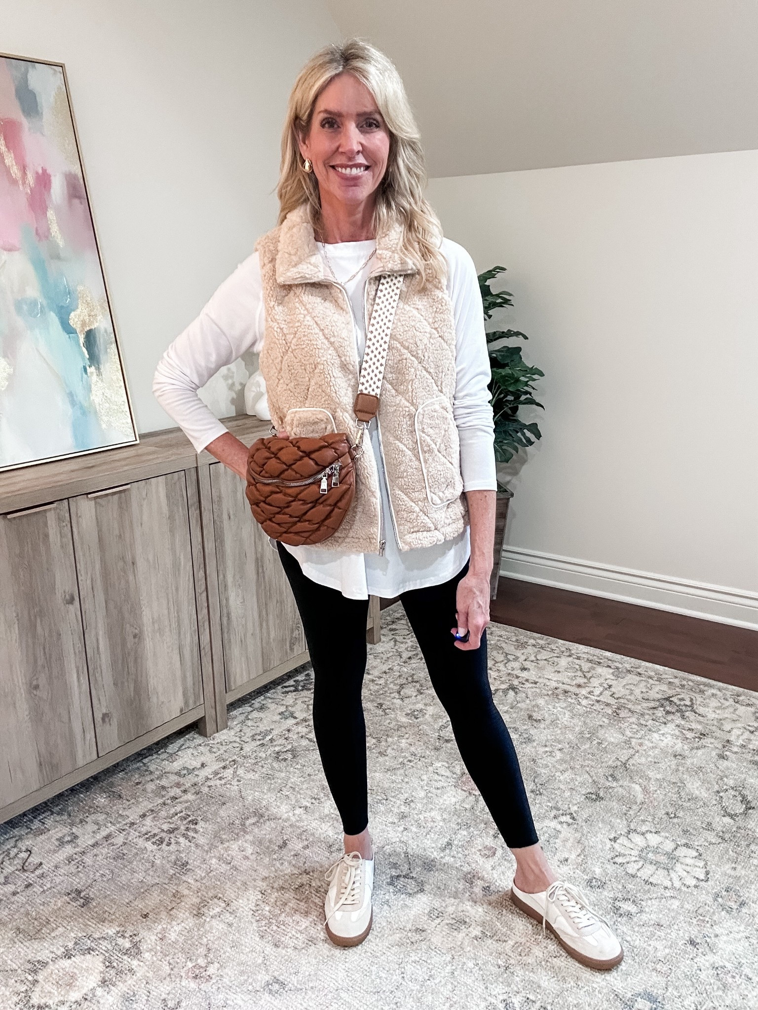 At 54, I'm not giving up my leggings but I like to cover up the 🍑. So I wear an Amazon tunic top and comfy vest and always add accessories!

Vest comes in 4 colors and I am wearing a medium in both the vest and tunic. 

#LTKStyleTip #LTKOver40 #LTKFindsUnder50