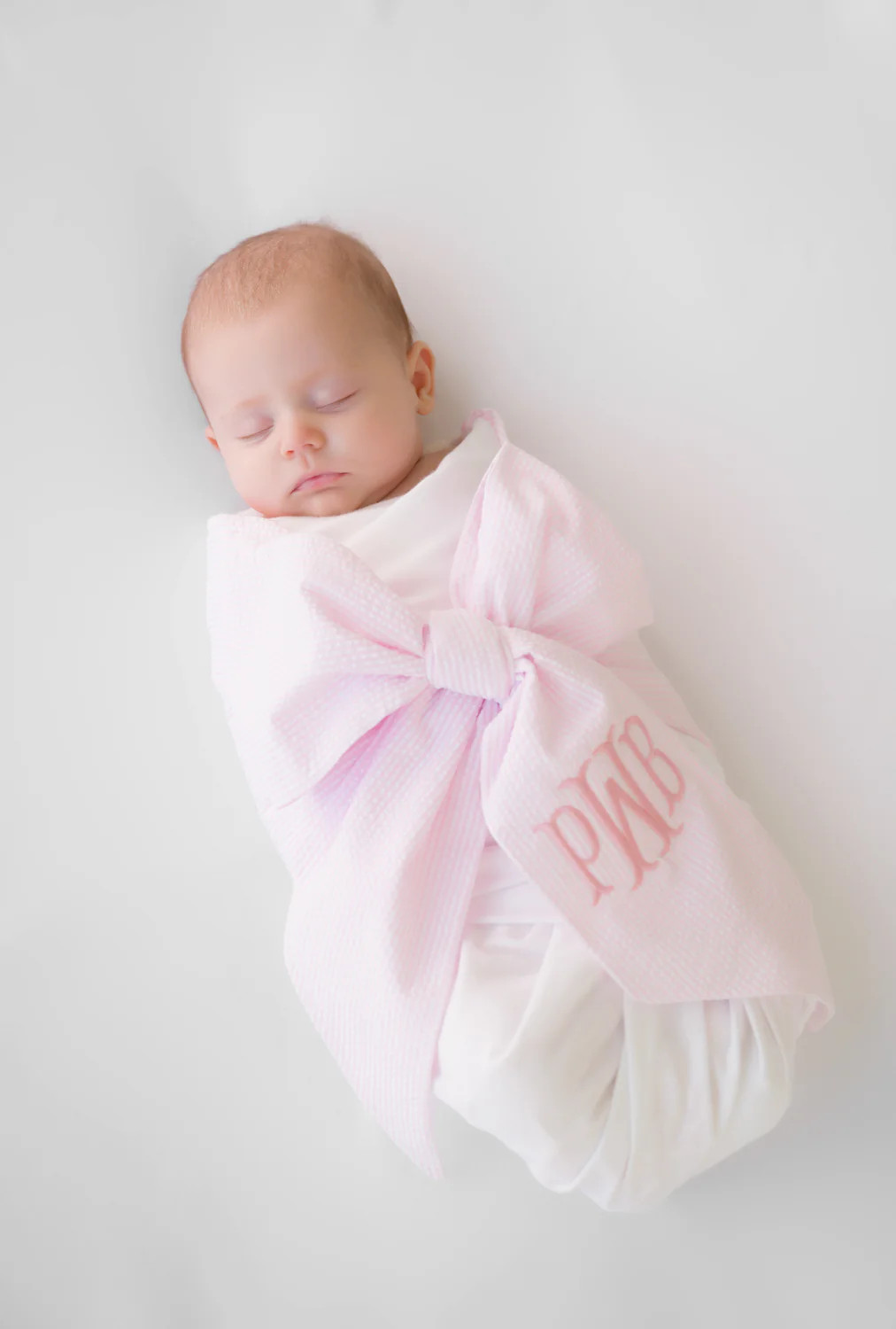 Bow Swaddle ® - Pink Savannah Seersucker | The Beaufort Bonnet Company