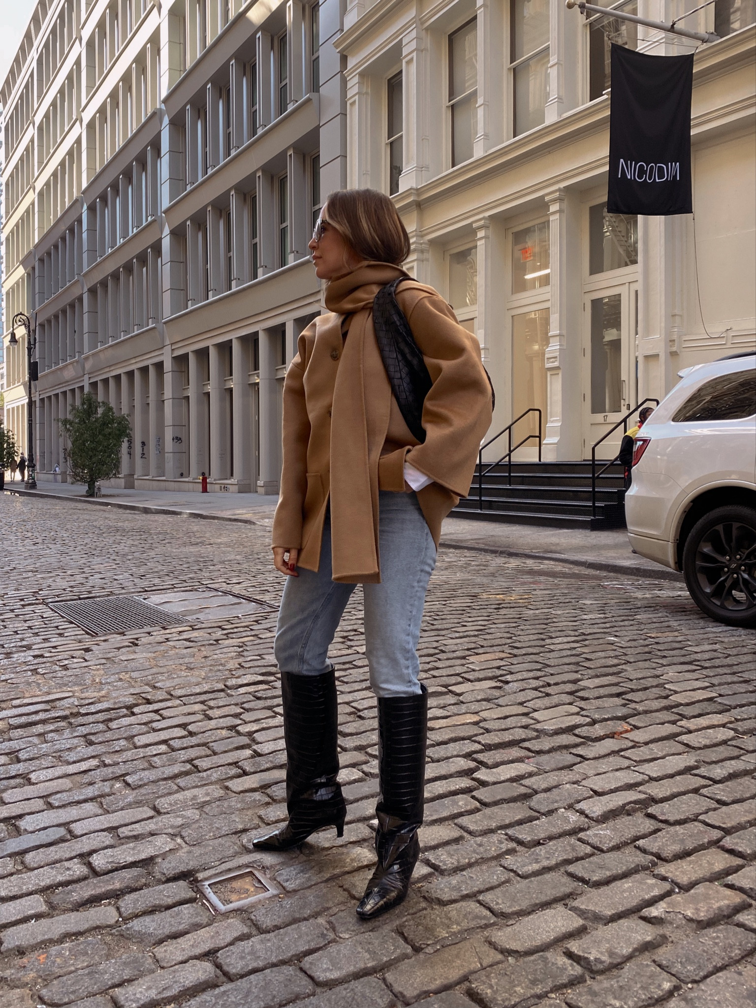 Wearing a size 34 in the coat! Mine is Toteme but also including an option for less. I have ordered from NAP before and was very happy! But be warned, shipping takes weeks. 