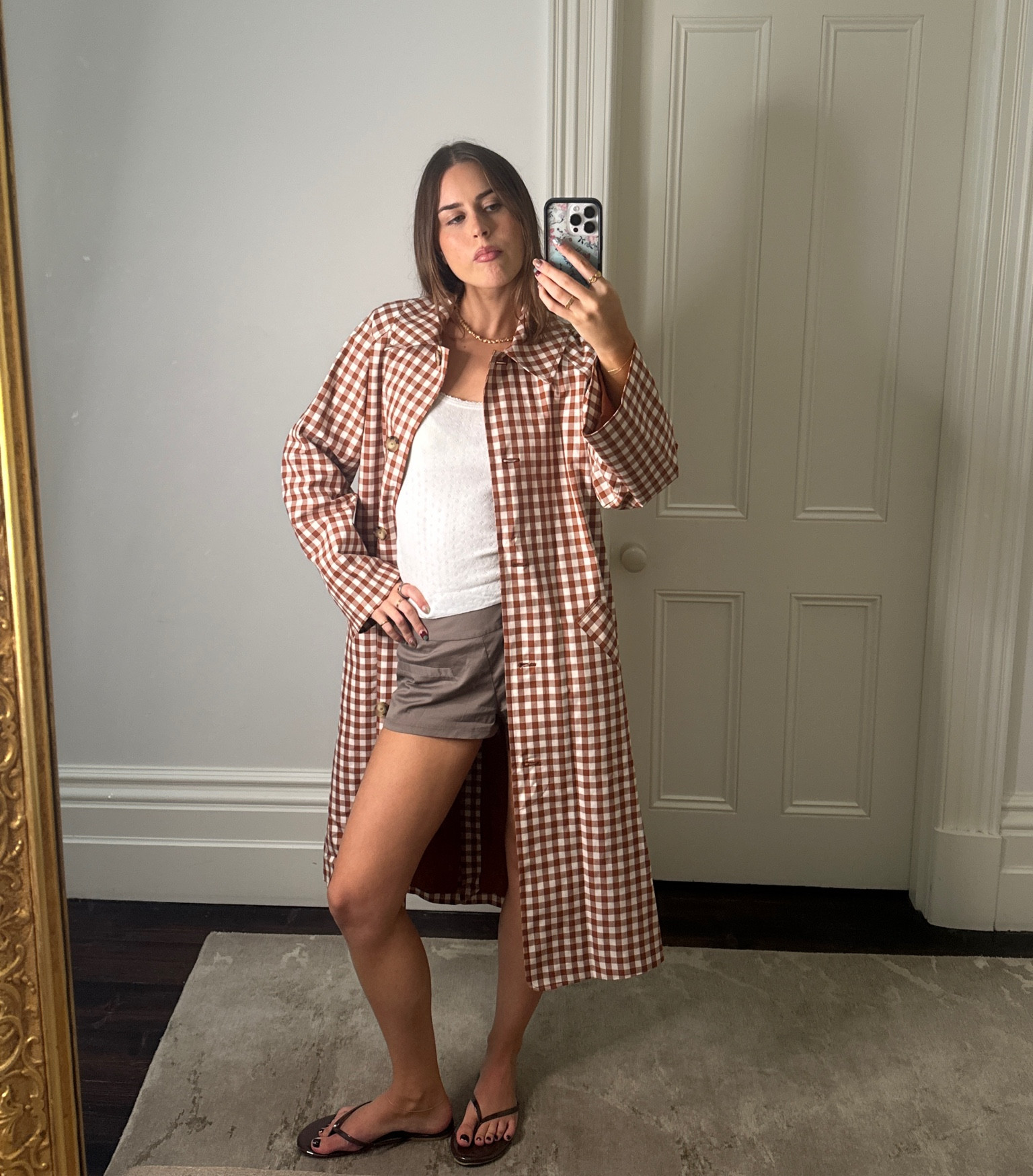 the coolest trench coat i’ve ever seen!

shorts are Mode Mischief 