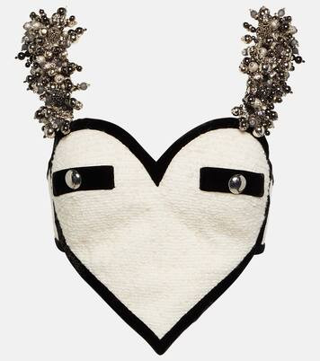 Area | Mytheresa (US/CA)