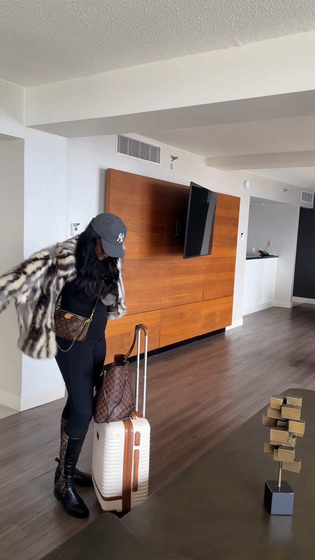 All black everything with a side of Fendi boots and Louis carry-on vibes. Travel fit locked in.

#LTKTravel #LTKStyleTip #LTKWatchNow