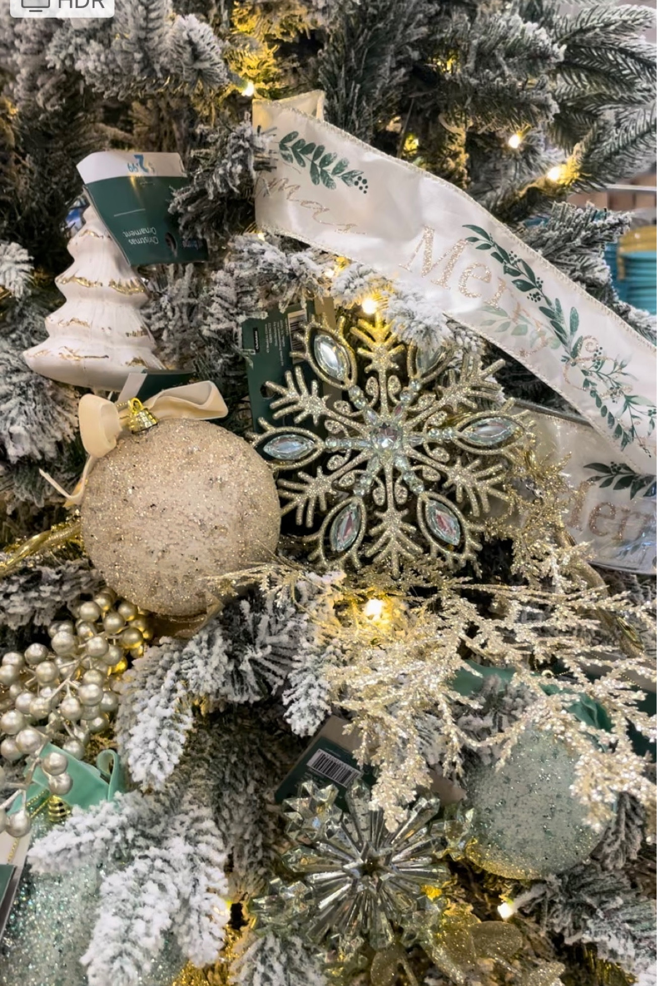 We used beautiful gold as the base for this flocked Christmas tree and accented it with the trending icy blue/green ornaments. It’s so beautiful together.

#LTKSeasonal #LTKHoliday #LTKhome