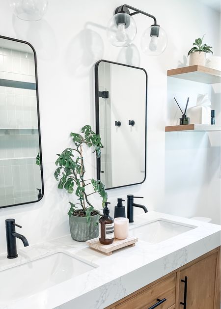 Obsessed with our bathroom reno 😍

Bathroom vanity, double sinks, clean modern bathroom, matte black hardware, wood vanity

#LTKFamily #LTKHome