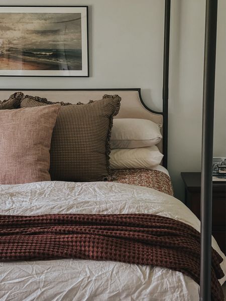 Neutral and moody bedding. Gingham pillows, Kantha quilt, waggle blanket, Mellanni sheets

#LTKHome #LTKFamily
