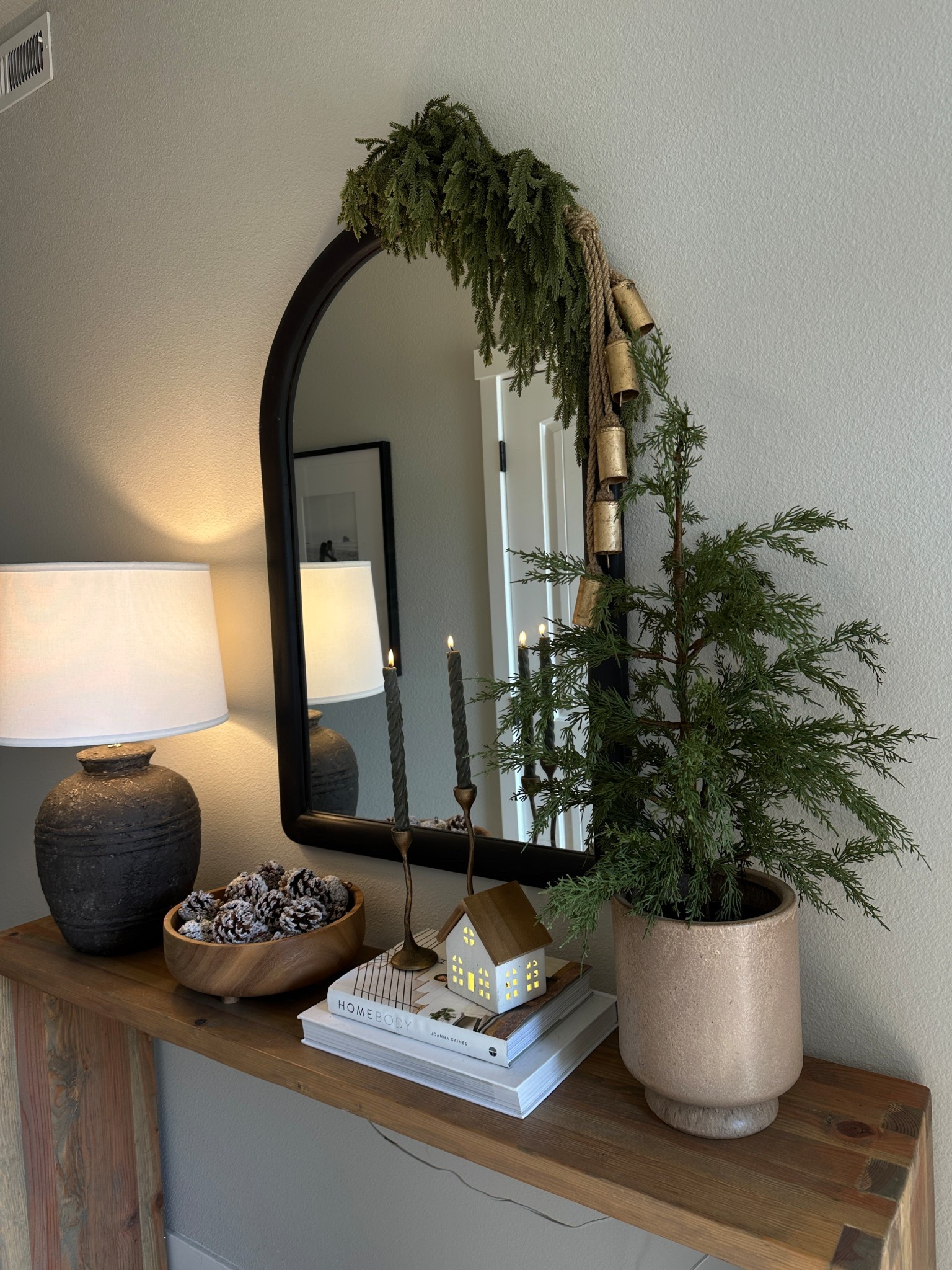 Christmas entryway table 

#LTKSeasonal #LTKHoliday #LTKHome