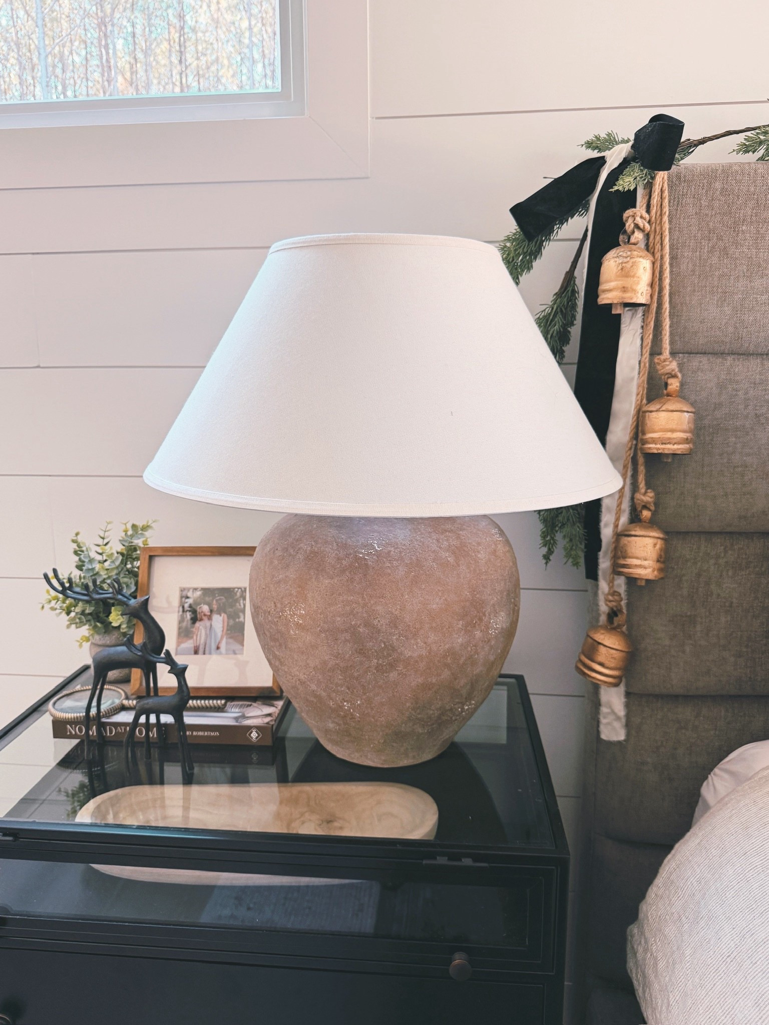 Who says Christmas decor has to be bold to feel festive? 🤍🎄

Sometimes the softest touches — a garland draped with bells, a textured lamp, and a hint of greenery — create the most inviting warmth. This Modern Classic bedside moment is simple, timeless, and full of cozy holiday glow.

#porcheandco #modernclassic #christmasdecor #holidayinspo #neutralchristmas #bedroomdecor #modernclassicinterior #cozyinteriors #holidaystyle #holidayseason #interiorstyling #homedecor #timelessdesign #holidayhome #interiorinspo

Do you want to bring our dreamy Modern Classic style interior design into your own home? 🏡 You’re in luck! Reserve our Online Interior Design packages today -> https://porcheandco.com/edesign ✨ We can’t wait to work with you & design your home with #porcheandco


#LTKStyleTip 

#LTKHome #LTKHoliday