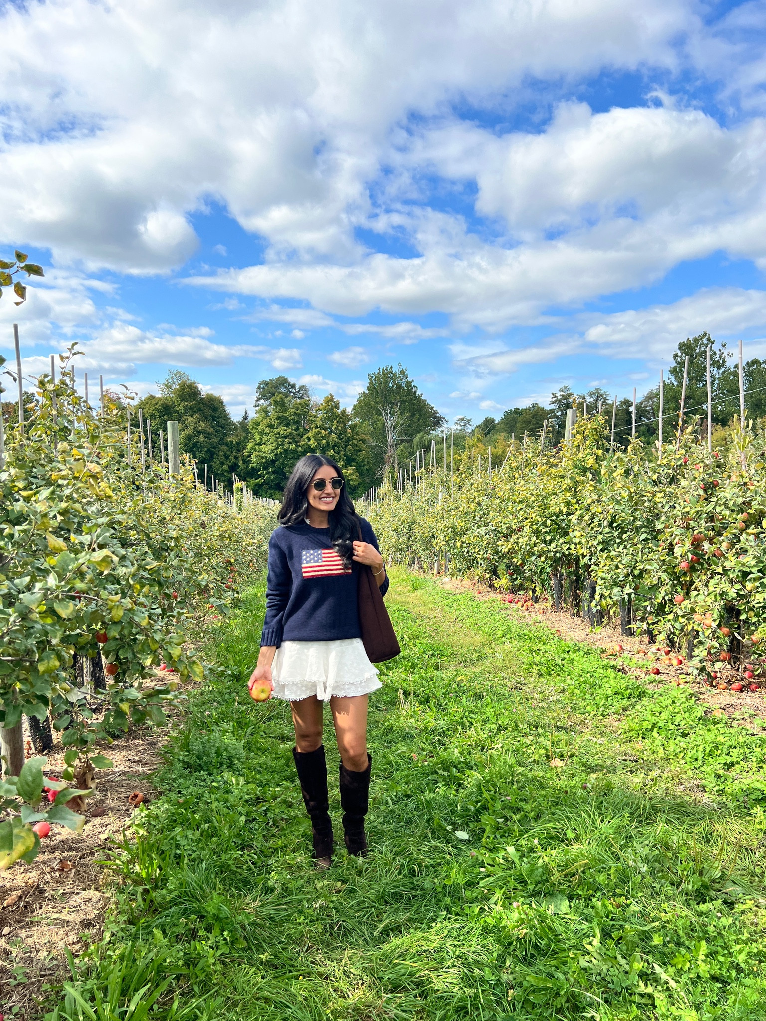 Spent the first day of fall apple picking upstate 🍎  my exact sweater is the Ralph Lauren “iconic flag” sweater in a boys XL