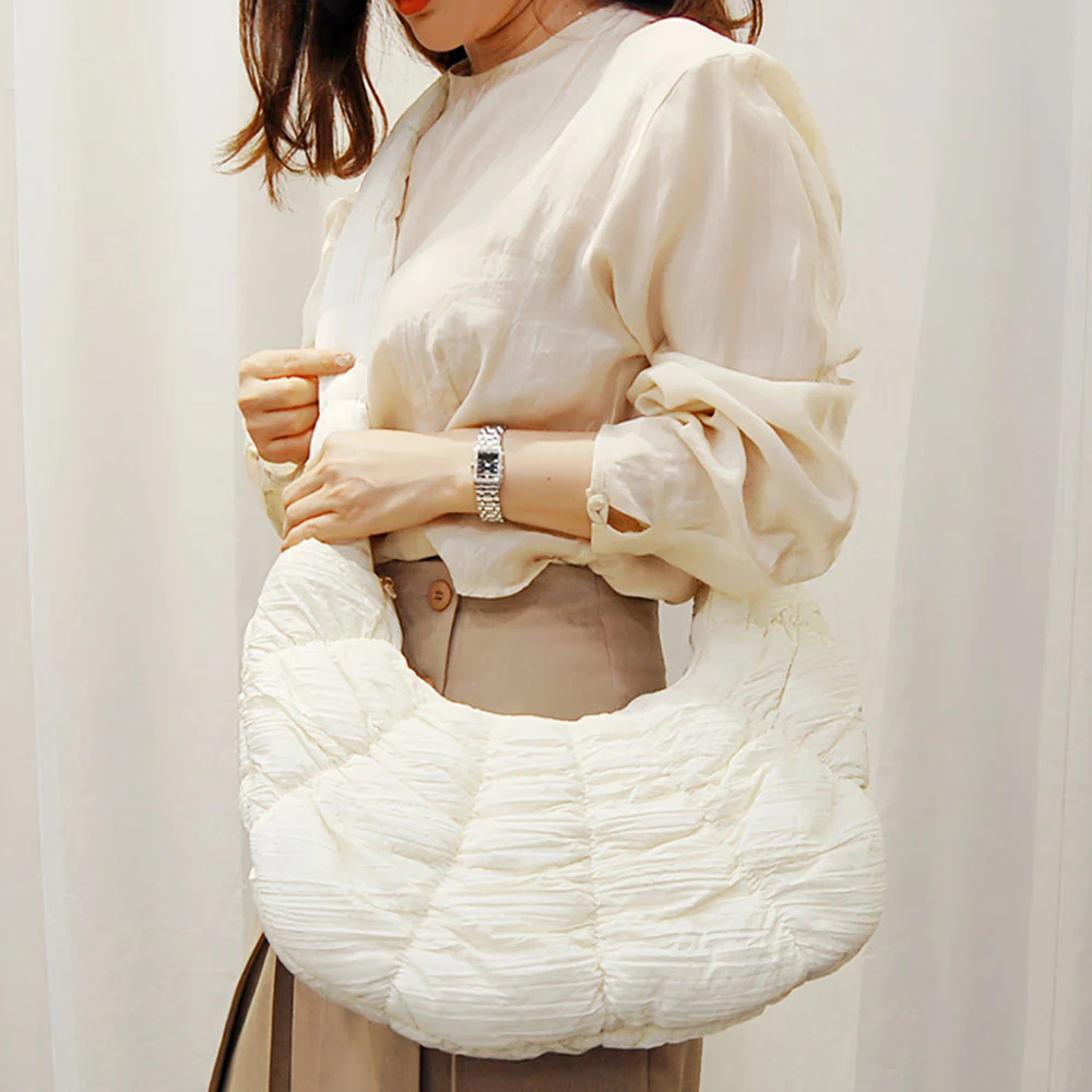 Quilted Puffer Croissant Cloud Crossbody Bag | Shop Simon