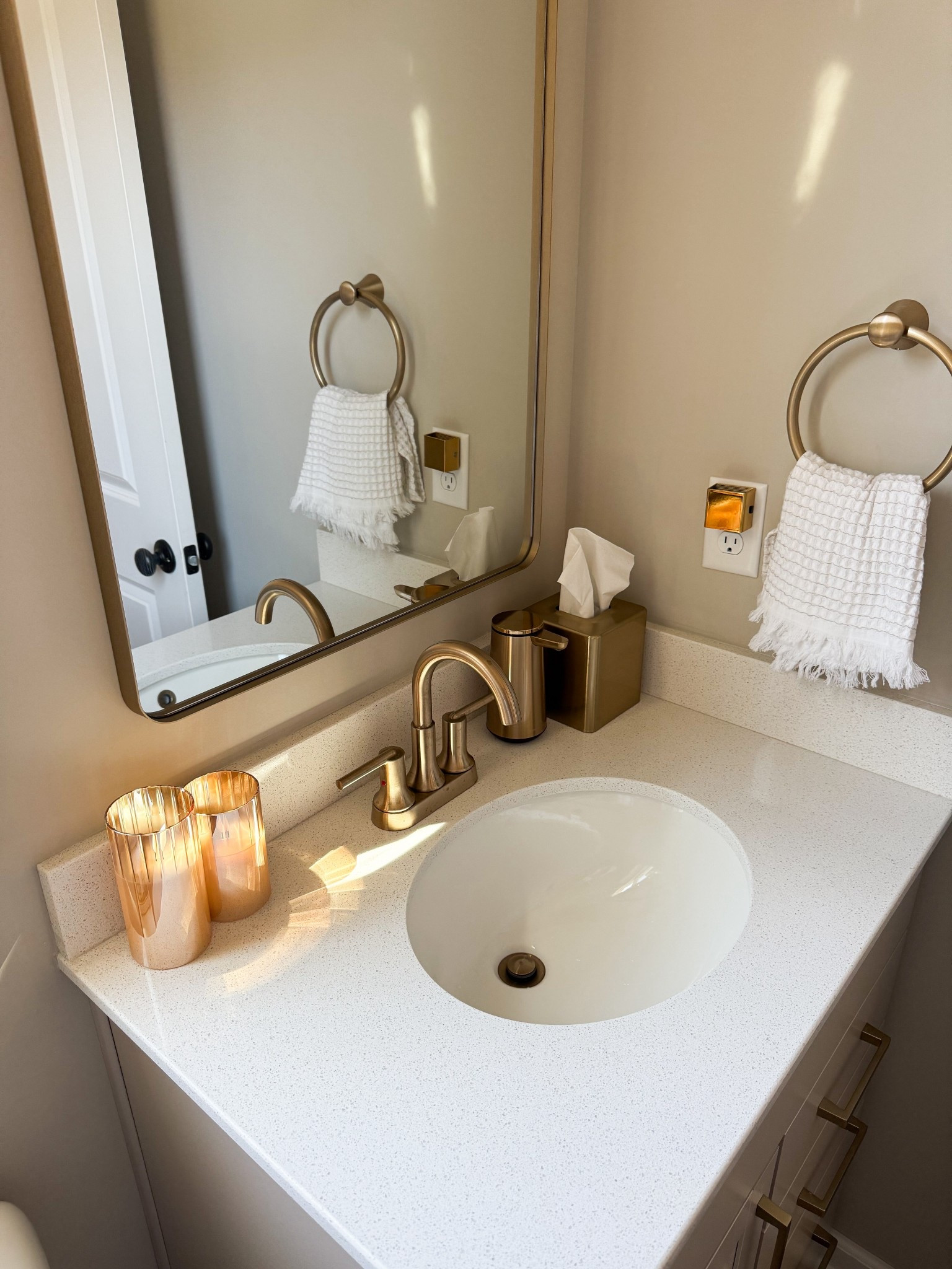 Small bathroom refresh with chic brass fixtures, gold vanity accessories, textured hand towels, and warm candle decor. Simple guest bathroom styling ideas to make your space feel elevated, clean, and hotel-inspired. #LTKHome #BathroomDecor #GuestBathroom #SmallBathroomIdeas #VanityStyling #BrassFixtures #BathroomRefresh #AmazonHomeFinds #NeutralHomeDecor #ModernBathroom

#LTKselfcare #LTKHome #LTKBeauty