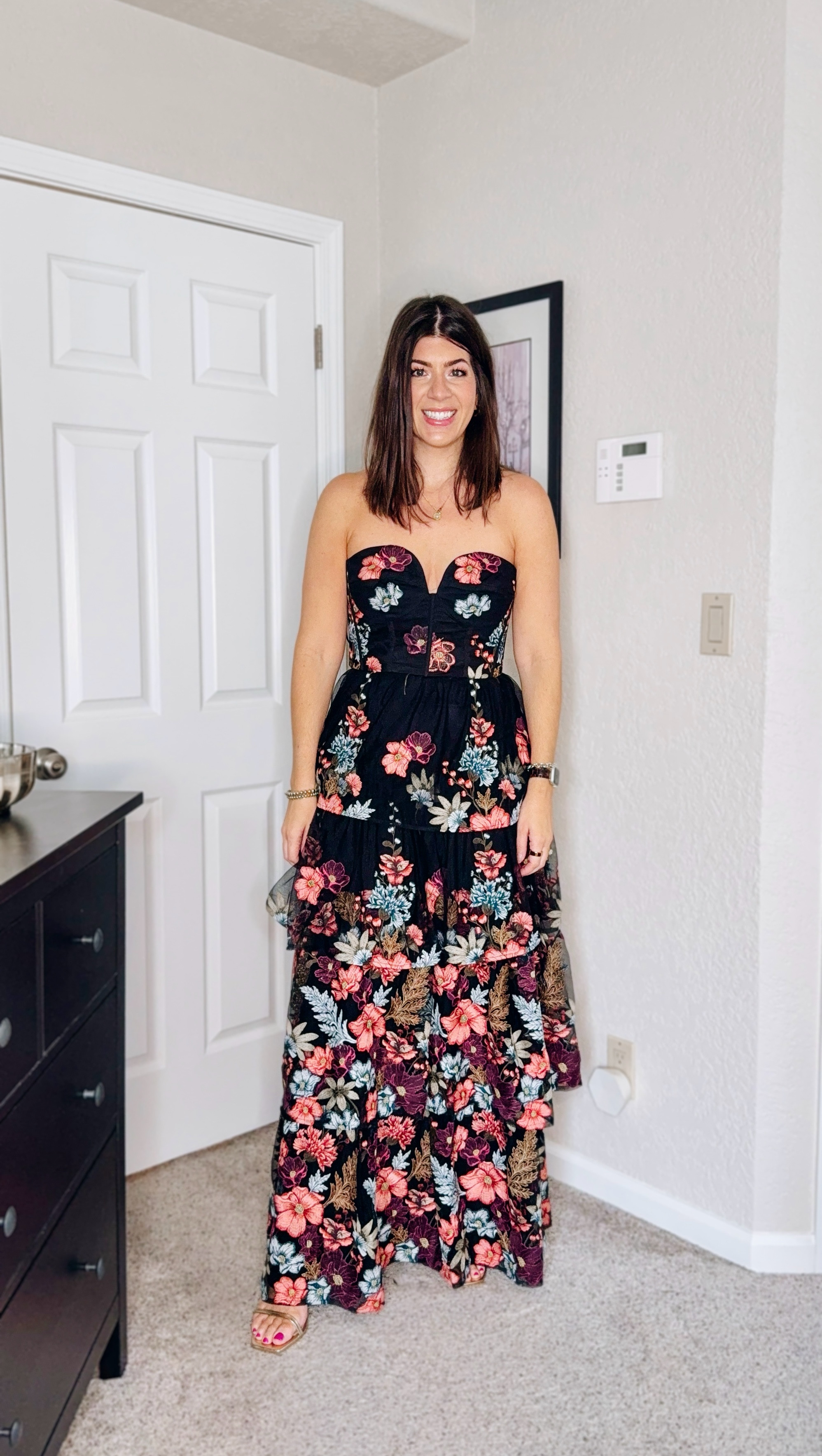 In a medium in the black strapless floral dress 

#LTKMidsize #LTKWedding #LTKOver40