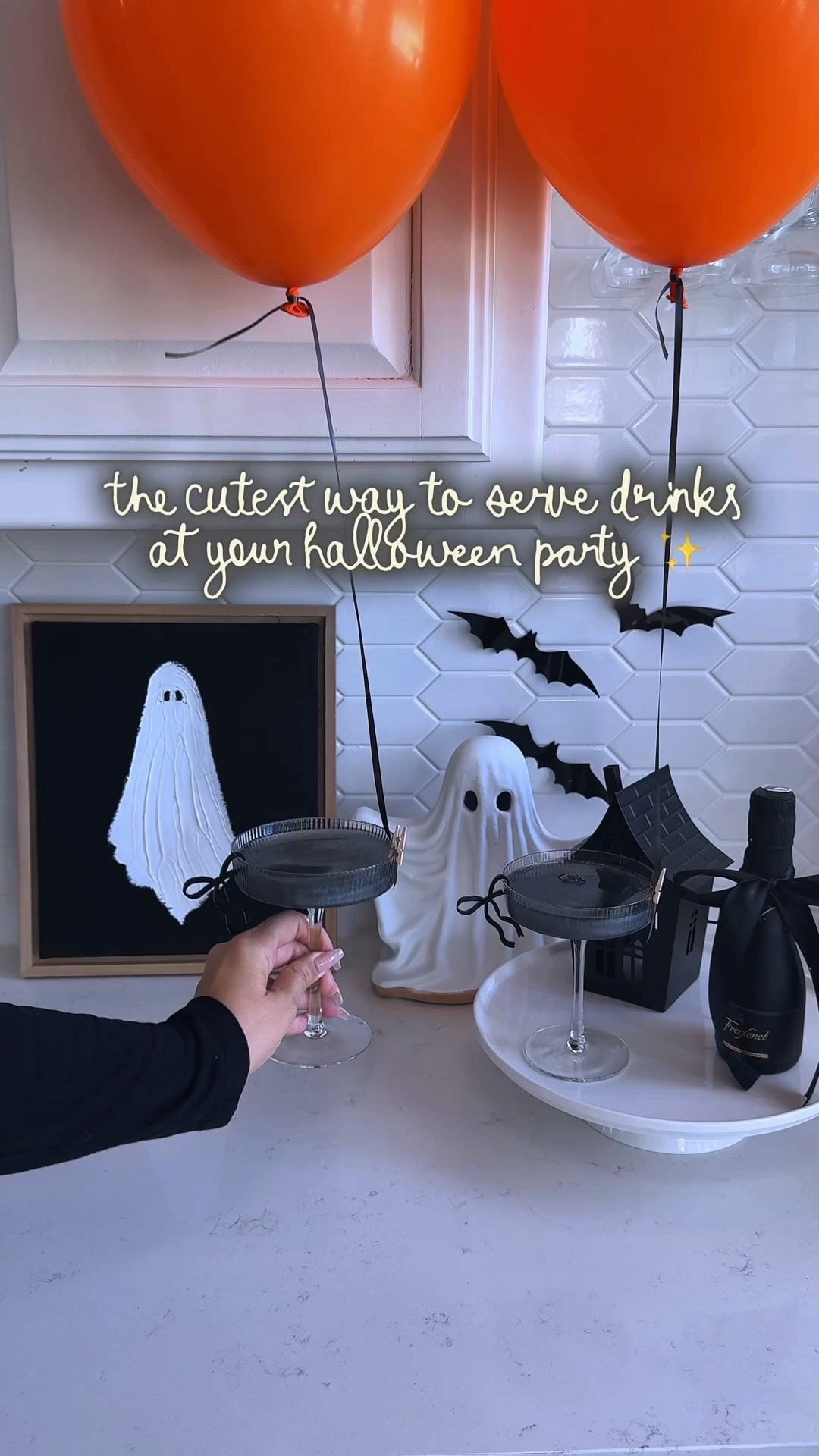 the cutest little halloween party drink idea! 🎈🖤👻

i added black edible glitter to the drinks, filled orange balloons with helium + tied one to the stem of each glass. such an easy detail but SO cute for a halloween party, girls’ night or spooky movie night! 🎃✨

you could do this with your favorite cocktail, mocktail, champagne or sparkling drink!

halloween drink ideas, halloween party ideas, halloween cocktails, halloween mocktails, halloween party drinks, spooky drinks, halloween entertaining, halloween hosting ideas, easy halloween ideas, halloween balloon ideas, halloween party decor, halloween tablescape, halloween girls night, spooky season ideas, halloween party inspiration

#LTKSeasonal #LTKHome #LTKSaleAlert