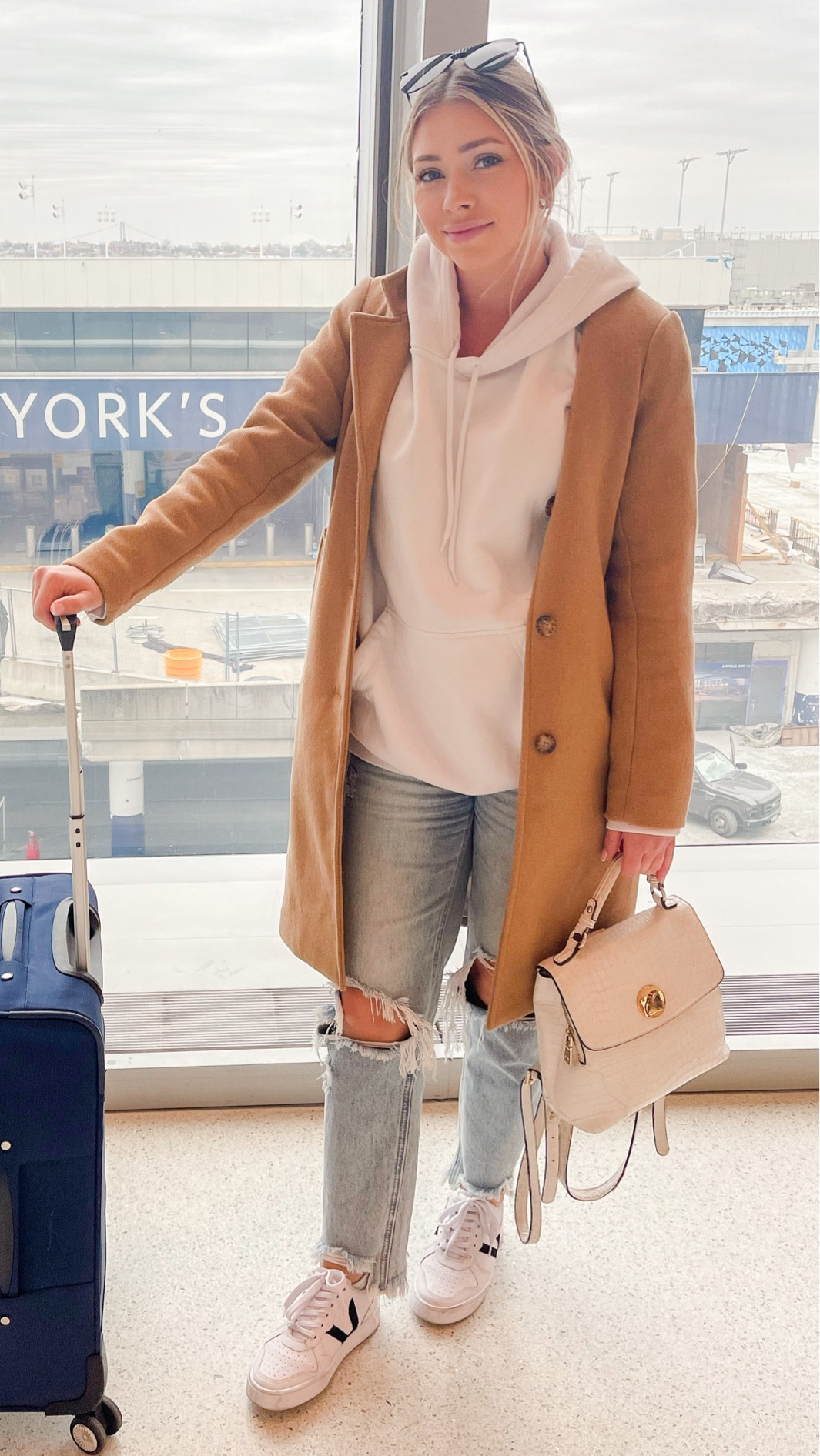 Didn’t take a photo the entire trip until the moment we got to the airport half asleep. Throw your boyfriends sweatshirt on with a dad coat, dad jeans, and sneakers 👌🏻 Salerno denim from Sartorial Collection in size 3. Not a great photo of them but I get the MOST compliments on them. York sneakers from Sartorial. #LTKtravel #LTKnewyork 