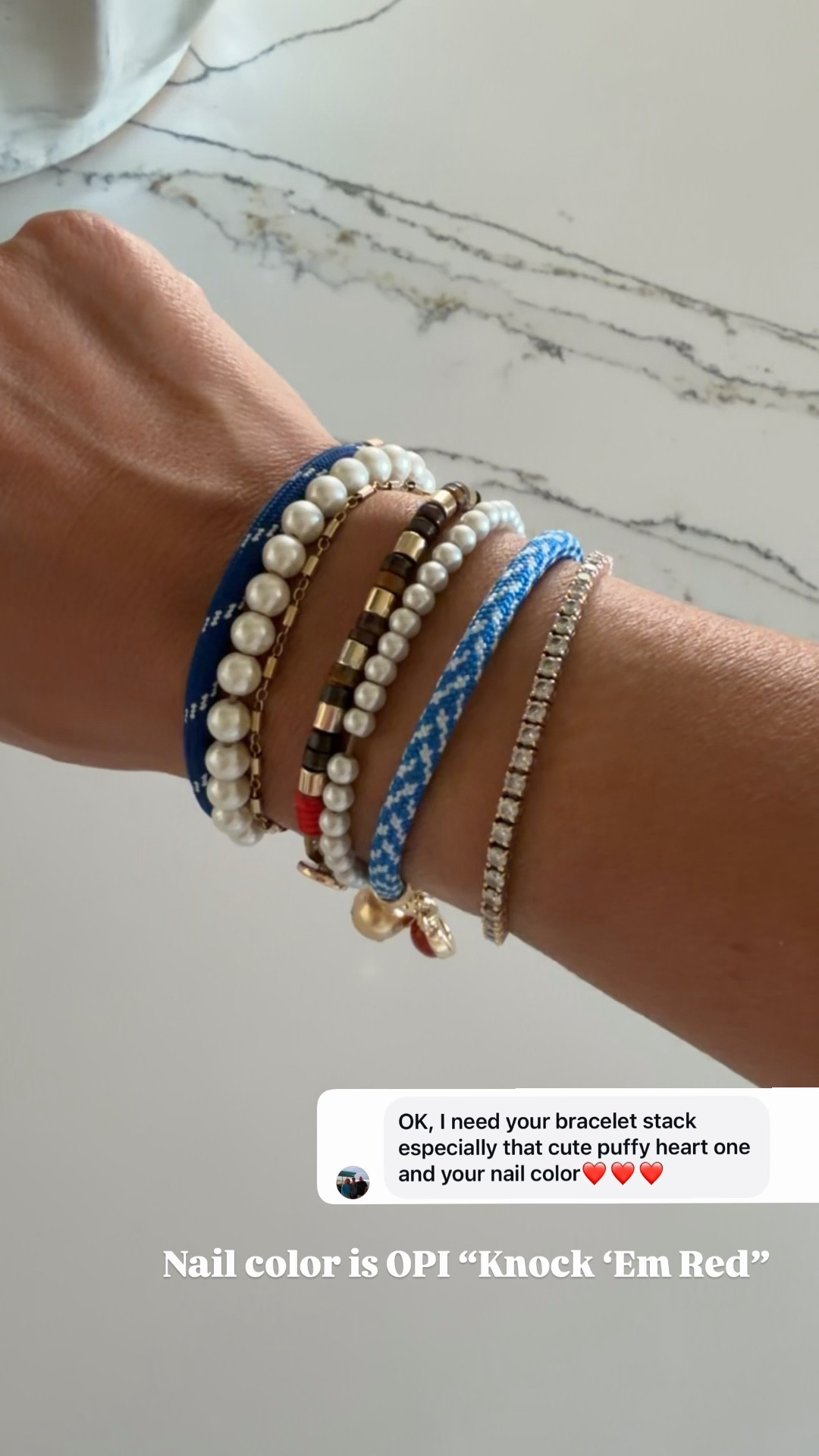 Bracelet stack and nail color is OPI Knock ‘Em Red. 

#LTKOver40