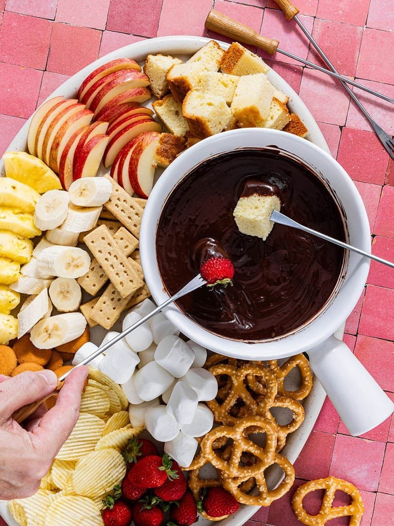 If fondue feels intimidating, I promise it’s not. Like all of my boards and recipes, the goal here is versatility. And it doesn’t get more versatile than a chocolate dip. You can tailor your chocolate fondue dippers to a festive theme or simply focus on your guests’ favorite treats. Either way, it’s a total crowd-pleaser.

#LTKSeasonal #LTKfoodie