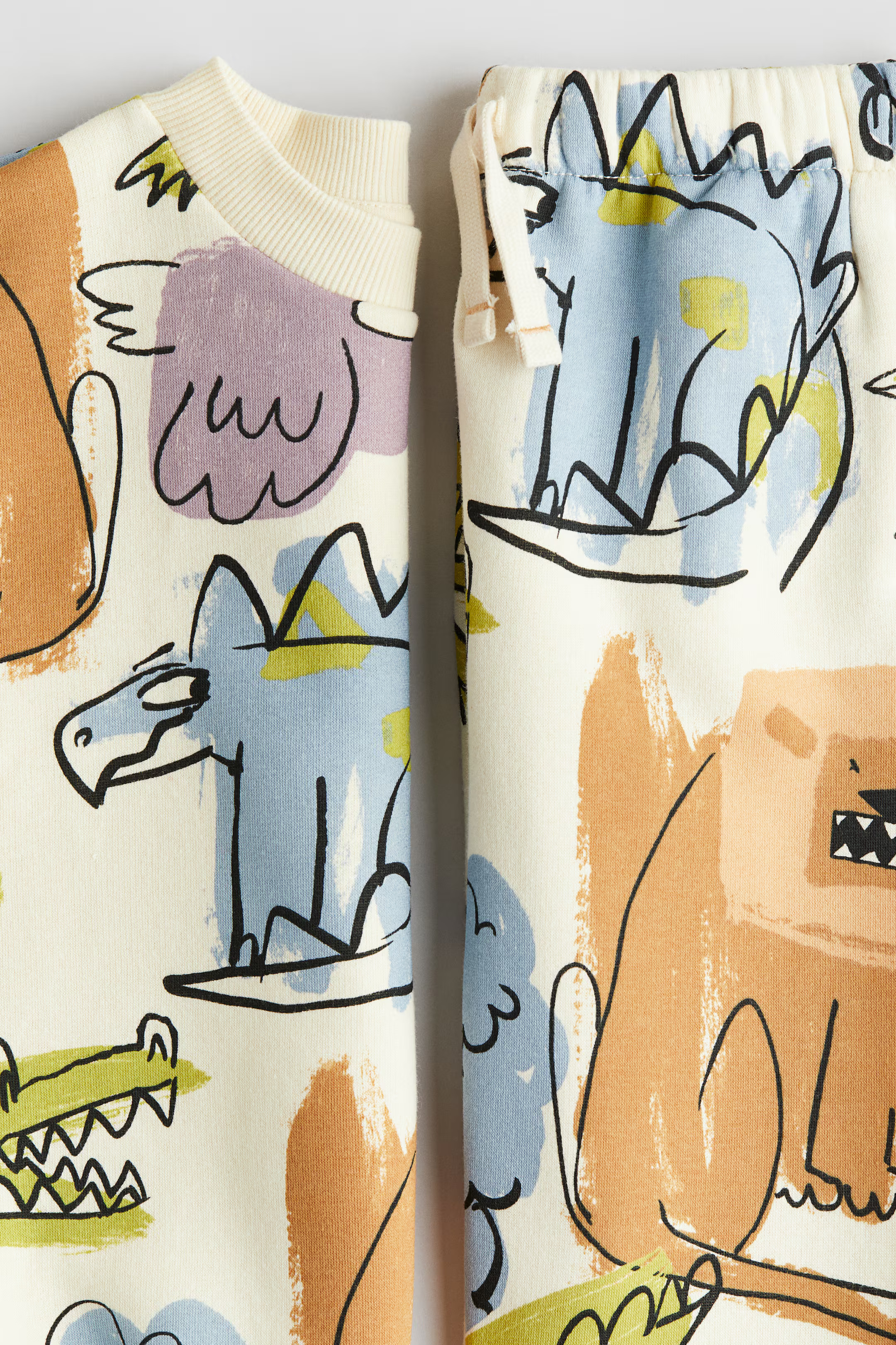 2-piece Sweatshirt and Joggers Set - Light yellow/animals - Kids | H&M US | H&M (US, CA, MX)
