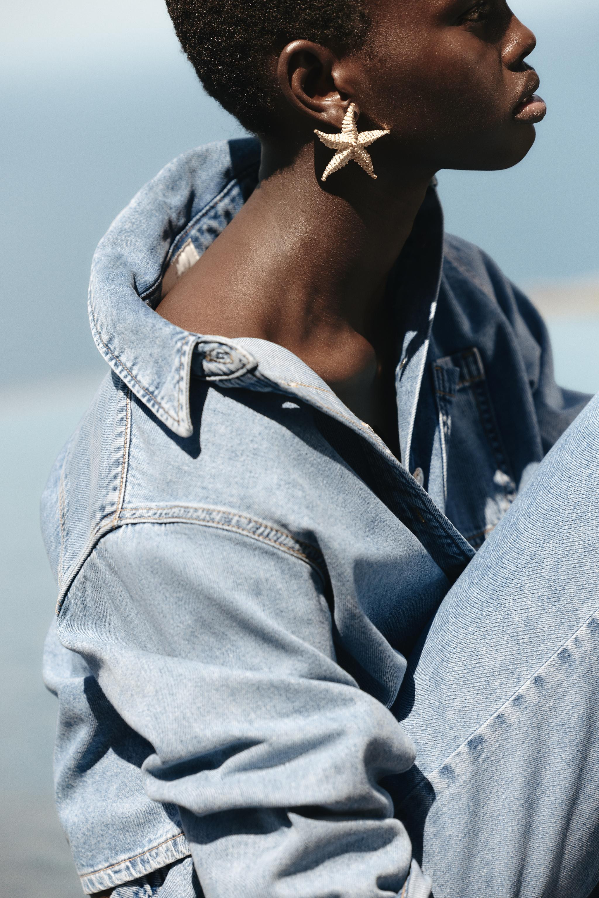 Shirt with lapel collar and long sleeves. Front patch pocket. Front metal button closure. | Zara US