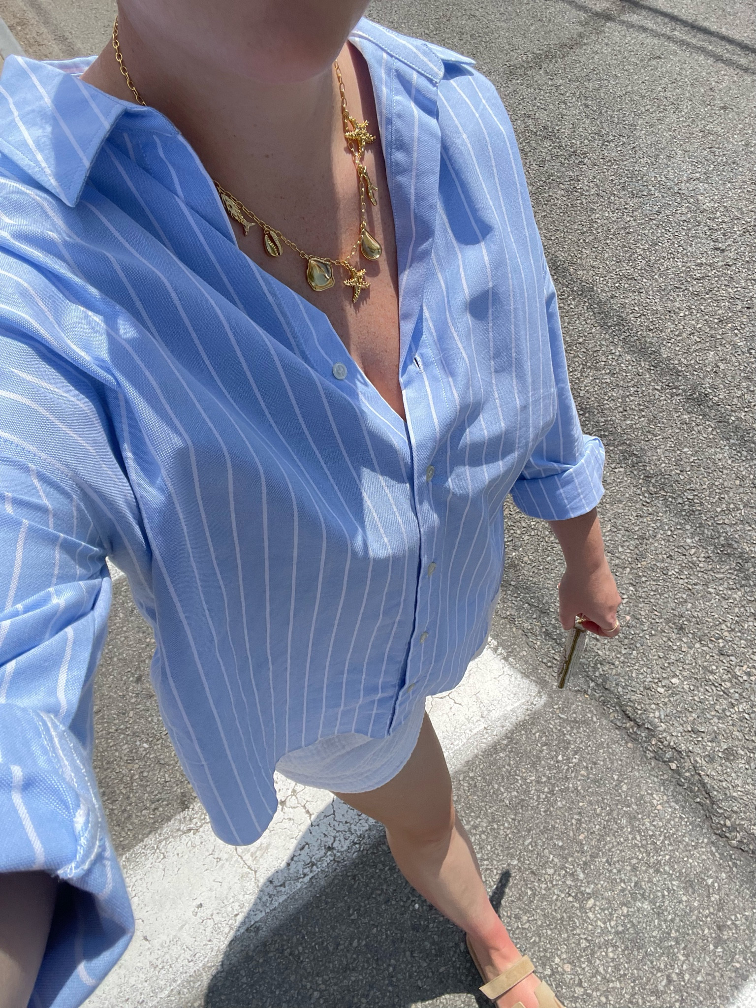 Easy everyday summer outfit. Charm necklace, beach necklace, striped button down, linen shorts, summer sandals, brown sandals, coin purse, beaded coin purse  

#LTKStyleTip #LTKSeasonal #LTKFindsUnder50