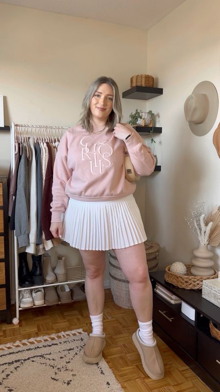 Midsize spring outfit - pink sweatshirt, white tennis skirt, Ugg Tazz, Amazon shoulder bag



#LTKSeasonal #LTKstyletip #LTKmidsize