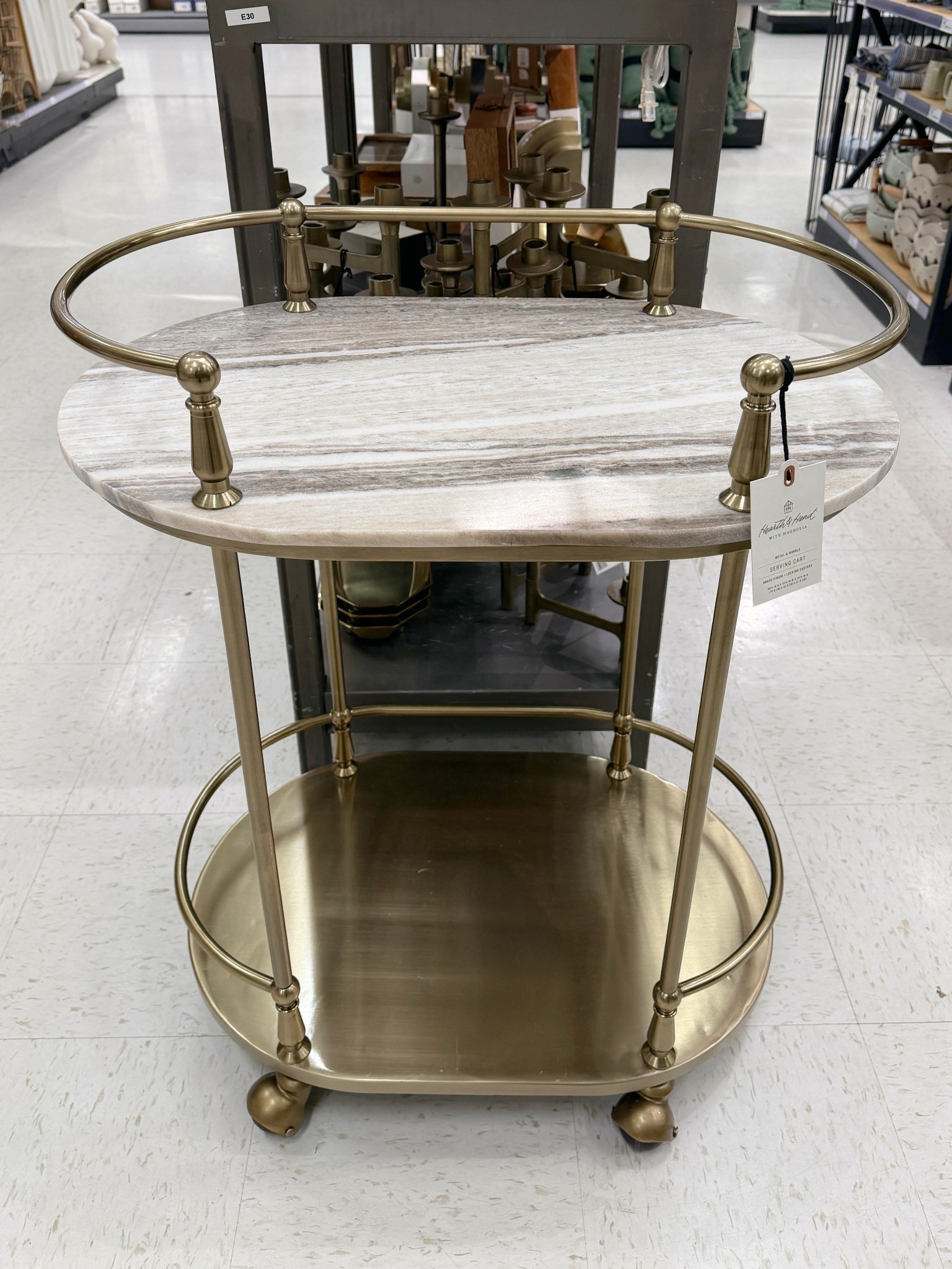 Spotted this beautiful Metal & Marble Bar Serving Cart from Hearth & Hand with Magnolia at Target and it’s stunning in person! 😍 The brass-gold frame paired with the marble top gives it such a luxe, elevated look while still being super functional. 🍾🥂Perfect for serving drinks, styling barware, or even using as a chic little accent cart in the kitchen or dining space. Linked it here! 🍸#TargetHome #BarCart #HomeDecor

#LTKSaleAlert #LTKHome