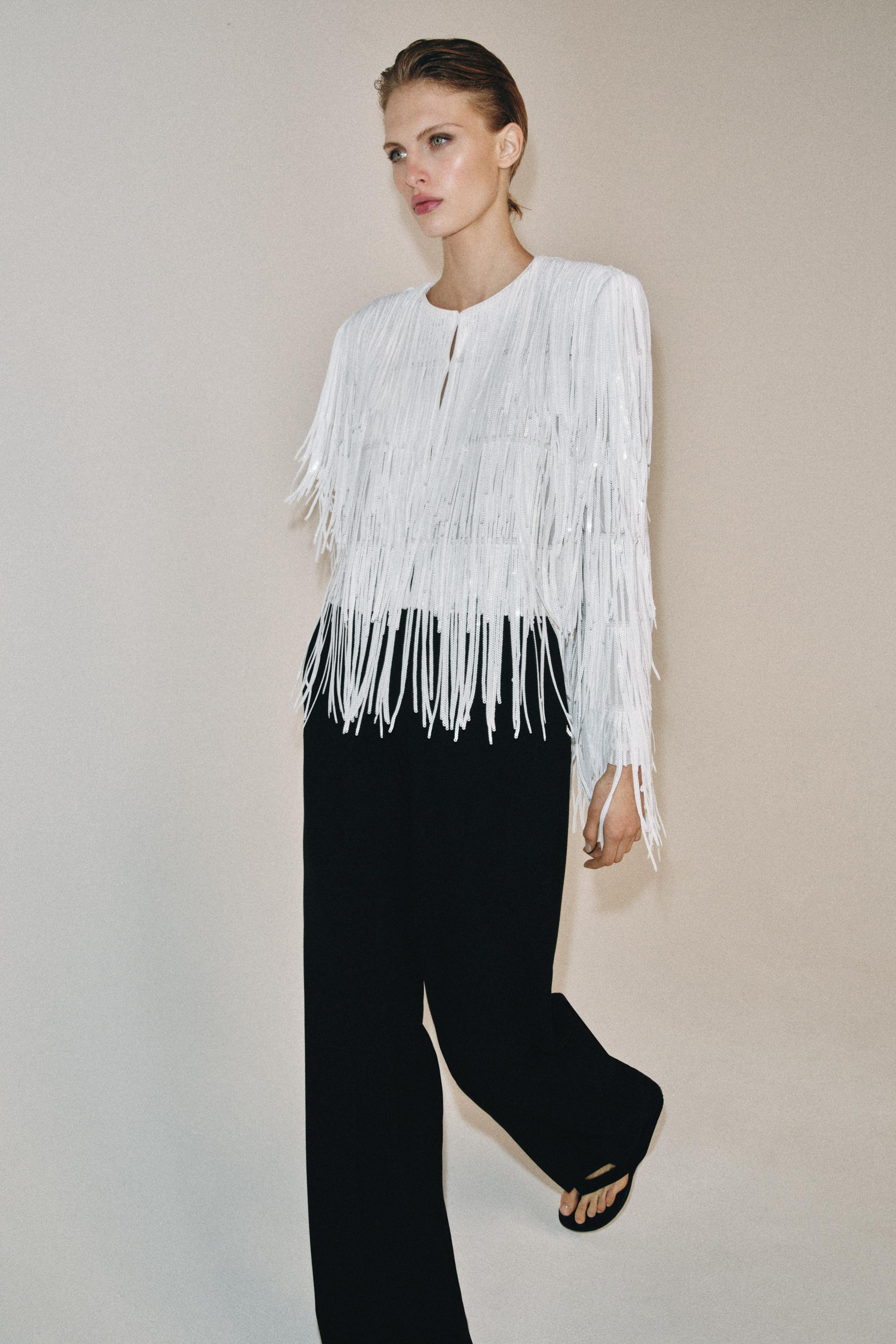 ZARA WOMAN COLLECTIONRound neck long sleeve jacket with shoulder pads. Sequin fringe detail. Inte... | Zara US