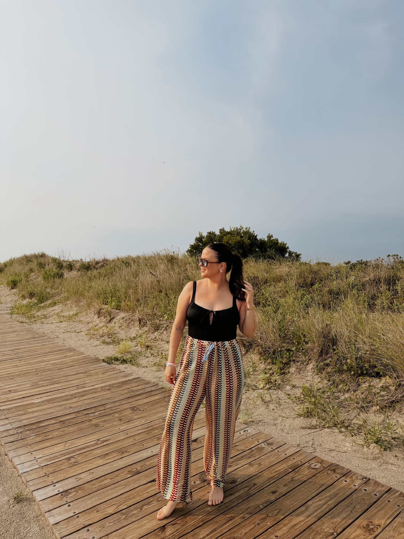 wearing a large in the swim, XL in pants 

 #LTKSeasonal #LTKMidsize