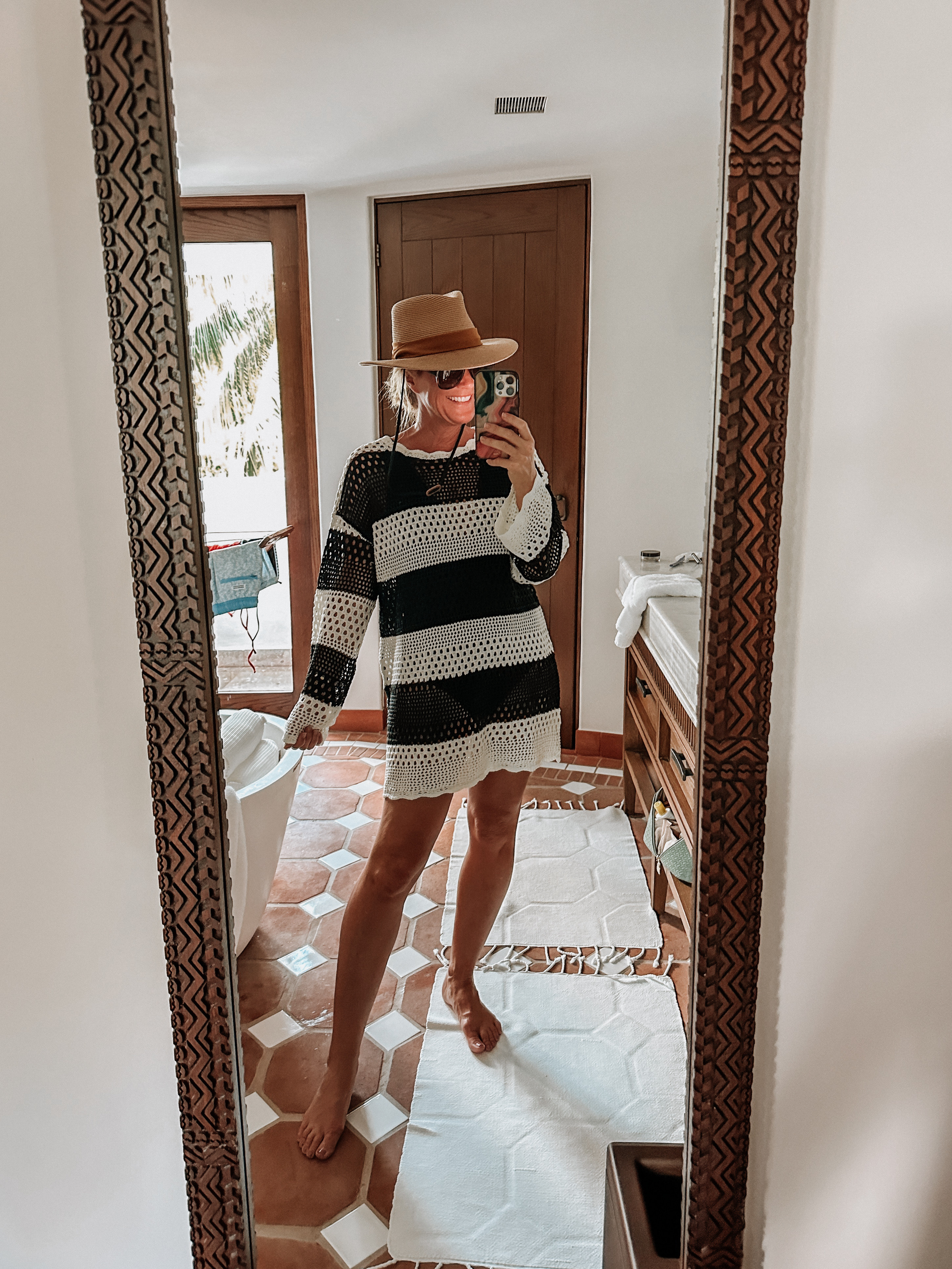 This crochet coverup comes in a ton of solids & stripe combos

#LTKOver40
