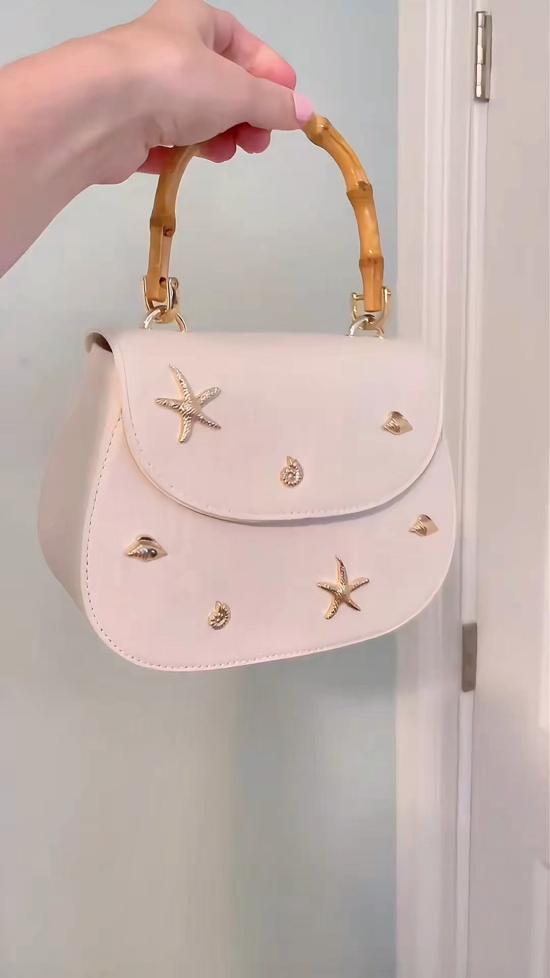 ✨ These beachy Target finds are shore to turn heads! I’m wearing the Universal Thread™ Women’s Nesryn Raffia Shell Slide Sandals in size 7.5 — raffia texture, metallic shell ornament, and cushioned insoles make them the ultimate coastal cuties 🐚🩴. Linked them for just $30!

👜 Paired with the Bamboo Top Handle Handbag from A New Day™ ($25) — the cutest canvas bag decked out in gold-tone sea motifs 🌟🐚🪸 with a structured silhouette and magnetic flap. The bamboo handle gives it that chic island vibe 🍹🌴.

🔗 Perfect combo for beach days, brunches, or your next seaside stroll! Linked both on my LTK 💛

#TargetStyle #BeachReady #CoastalAccessories #SummerStyle #ShellYeah #LTKunder50 #LTKsummer #LTKshoecrush #LTKbaglove #TargetFinds #PreppyStyle

#LTKFindsUnder100 #LTKFindsUnder50 #LTKItBag