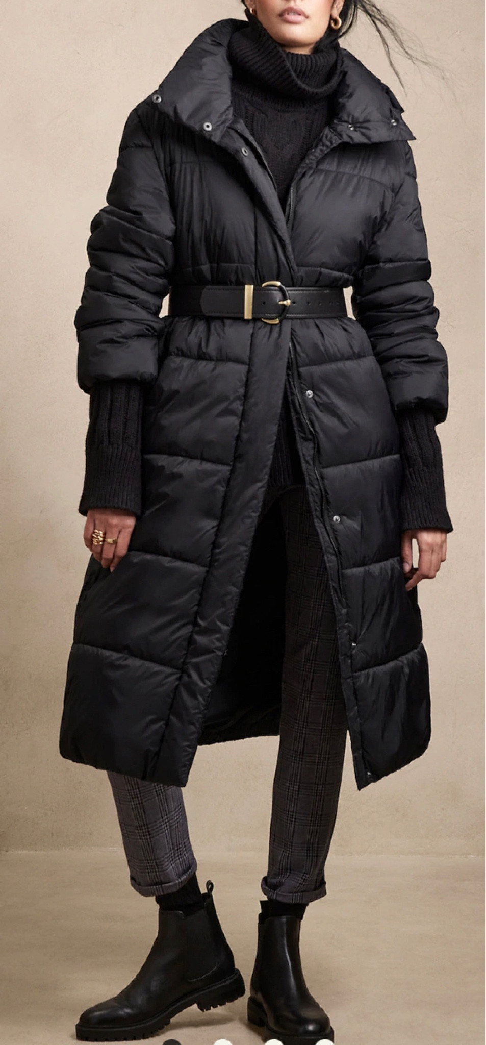 Long hooded puffer jacket 

#LTKSeasonal #LTKtravel #LTKsalealert