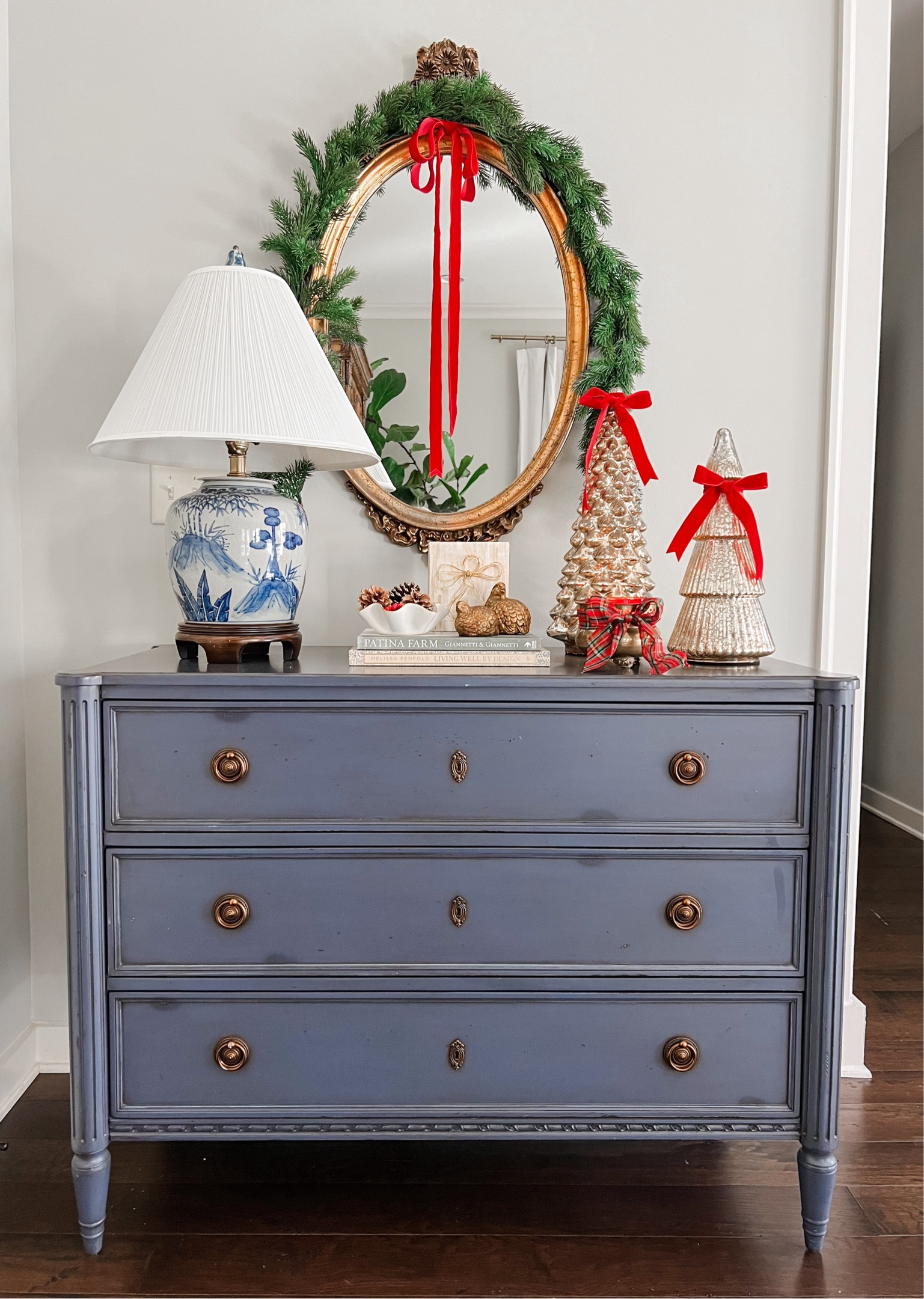 Christmas decor mercury glass Christmas trees velvet ribbon Christmas vignette styling gold oval mirror real touch garland Christmas home
Decor 

#LTKSaleAlert #LTKHoliday #LTKHome