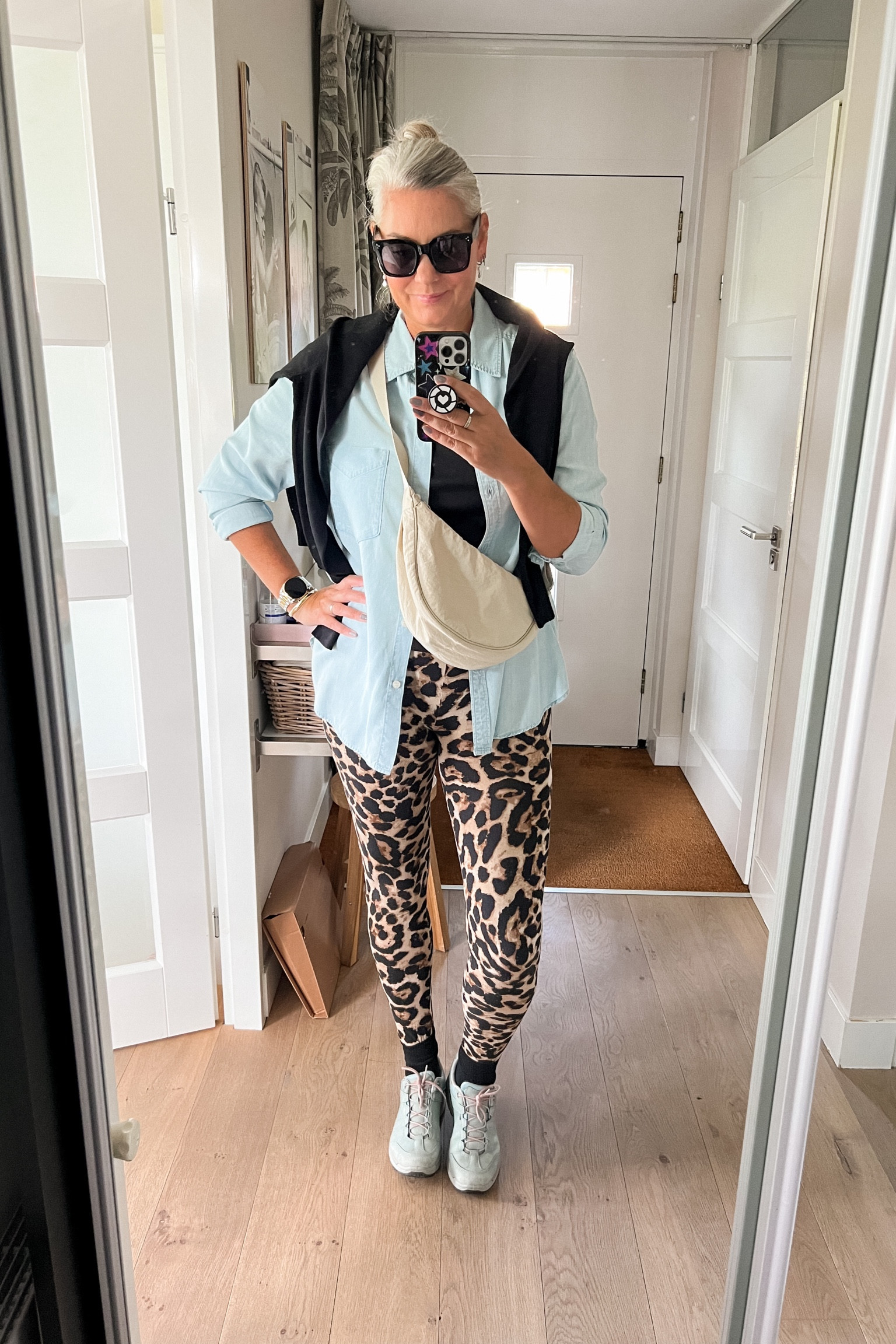 Going for a long walk wearing leopard print leggings, crew socks with smileys, the best basic black t-shirt (100% Supima cotton), a chambray buttondown shirt, a lightweight black, merino wool sweater, oversized sunnies, a lightweight beige crossbody bag and Lowa hiking shoes. 



#LTKmidsize #LTKfitness #LTKover40