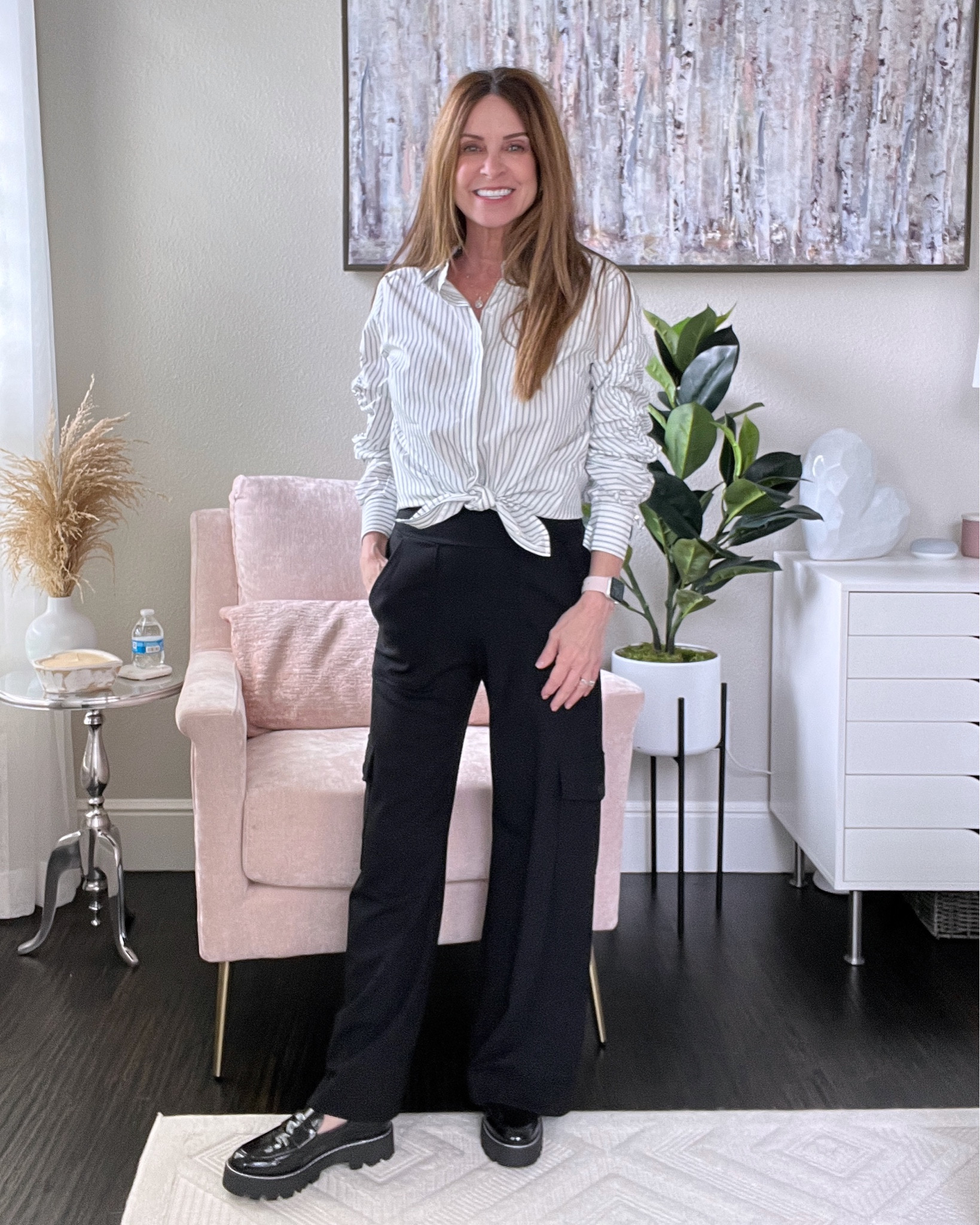 This is a MUST HAVE top for year round wear. It’s a classic striped button down shirt with shirring down the sleeves so you can customize the look. Runs tts. I’m wearing a size small.

The pants are sooo comfy! They're called the Chargo. They have a high waist and can be dressed up or down. I'm wearing size XS and had them hemmed for the perfect fit.

#timelessoutfit #fallfashion #transitionlook #petitefashion #midlifestyle

#LTKworkwear #LTKover40 #LTKstyletip