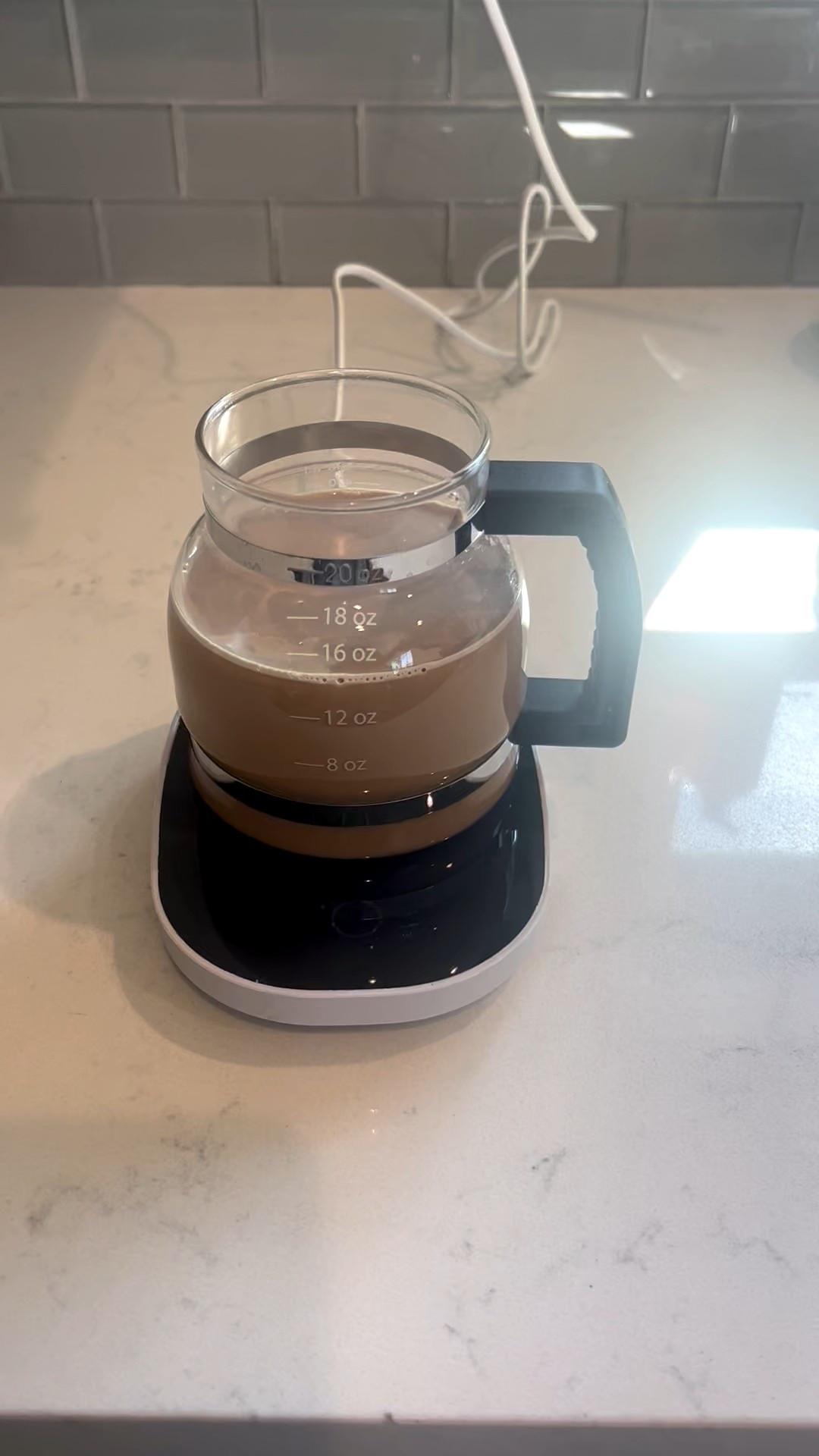 My new favorite gadget is this little coffee mug warmer. This is my all time favorite mug however I can't microwave it because of the metal but this little thing keeps my coffee the perfect temperature. Keeps it perfectly warm while packing my kids lunches. Obsessed! 

#LTKOver40 #LTKHome #LTKFindsUnder50
