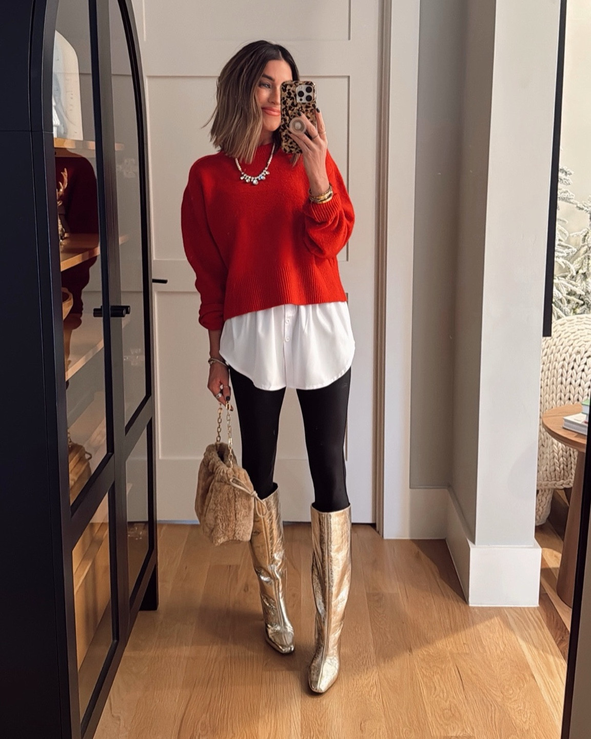 Easiest holiday outfit ever! ✨🎁 this shirt extender is genius and only $14, and my bag is $20 but looks way more expensive! 
Sweater (size XS) is true to size, and linked my exact leggings + a very similar pair too!

#LTKSaleAlert #LTKStyleTip #LTKFindsUnder50