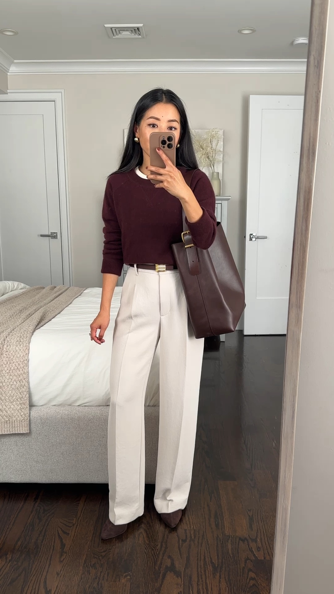 From my fall capsule wardrobe: Petite friendly work outfit. 

Use code HARVEST for 20% off the Madewell bag!

• Quince cashmere sweatshirt xs. One of my favorite petite friendly items from quince with a shrunken fit and banded bottom hem. Soft, warm, and lightweight for layering. 

• COS tee Xs - one of my favorite staple tees. The off white color is thicker, non sheer, and extra soft (not all colors are this soft, fyi). I sized up and love layering it under sweaters for a pop of white neckline. 

• edited pieces reversible equinox mini belt xxs, this style will be coming soon but the original is stocked on editedpieces.com

• Aritzia effortless trouser pants 0 short. Drapes beautifully. Runs a little long , the new Shorter length is ideal! 

• Amazon “the drop” faux suede brown ankle boots 5

• Madewell bucket tote - chic, roomy, and fits a laptop! I cut the excess tail end of the strap shorter 


#LTKWorkwear #LTKItBag #LTKStyleTip