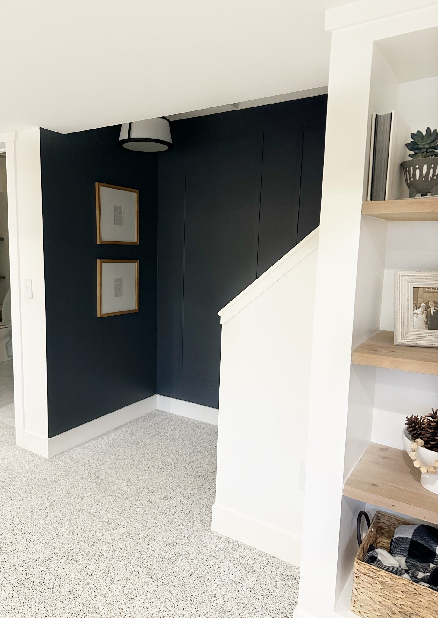 Stairwell makeover. Added this beautiful blue (SW Cyberspace in satin finis) to the bottom half of my stairwell to give it a custom look! 

#LTKFindsUnder100 

#LTKHome