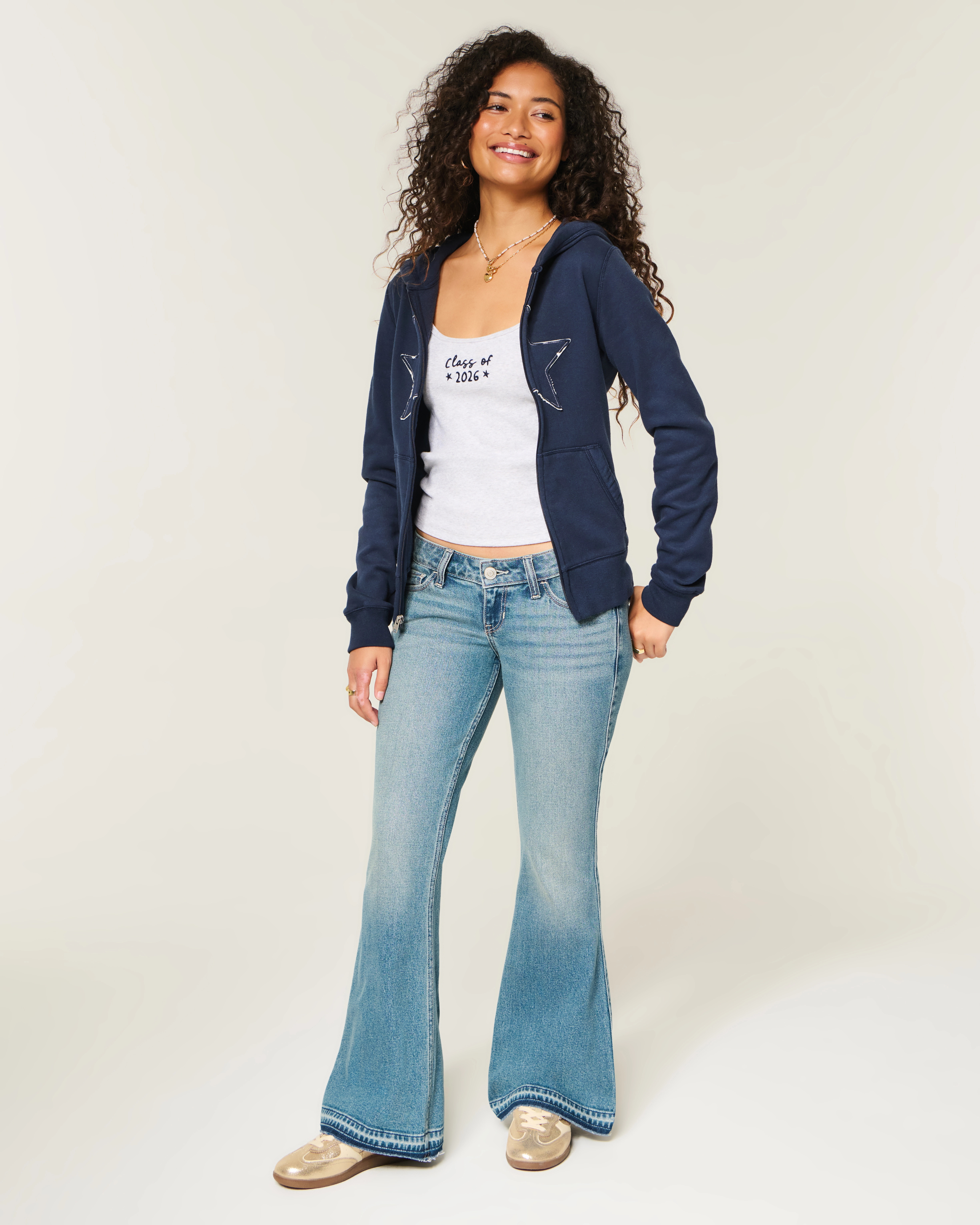 Ultra Low-Rise Medium Wash Flare Jeans | Hollister (US)