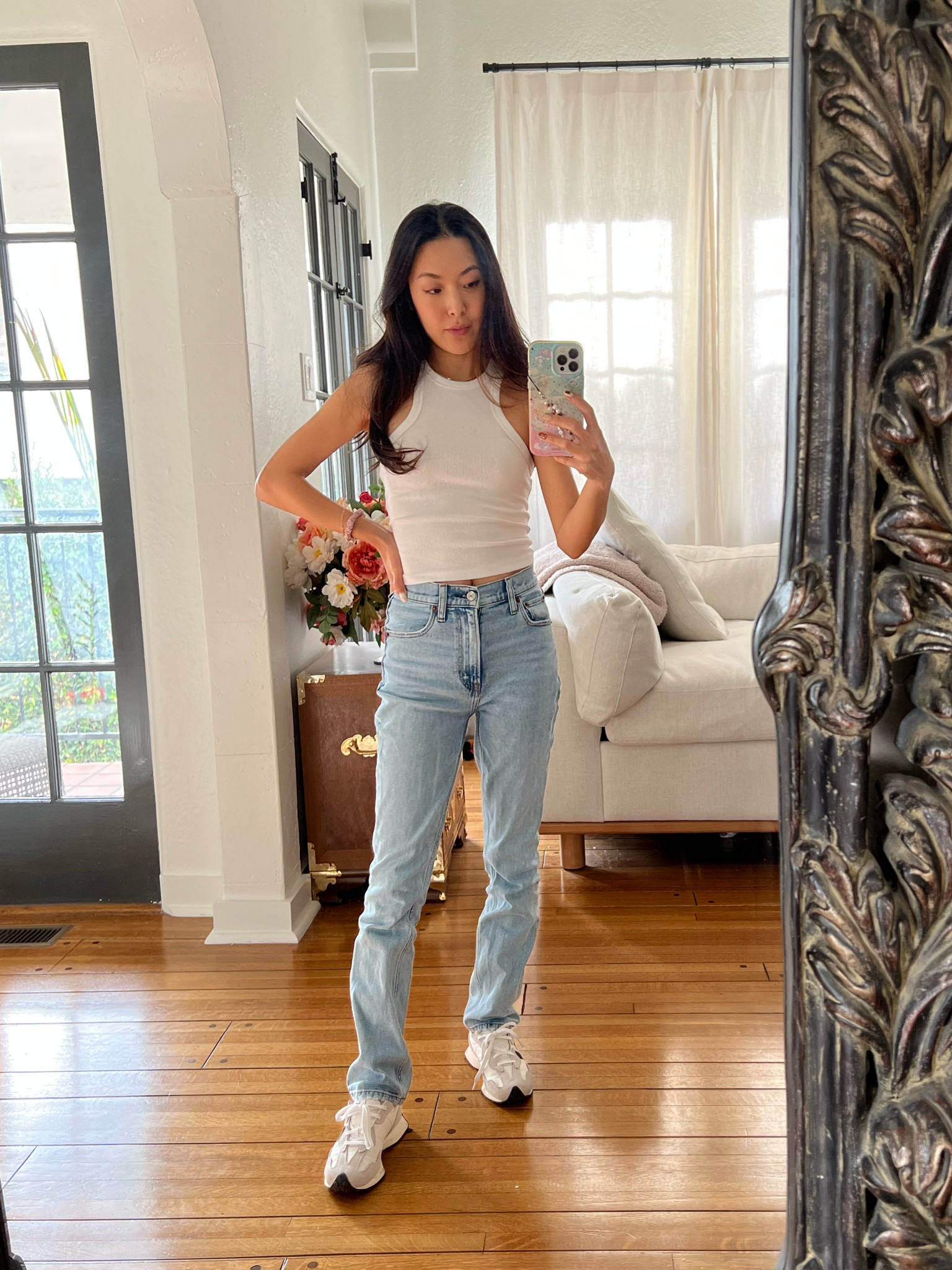 Simple tank + perfect everyday jeans combo 🤌🤌🤌 
I adore how this tank cuts in at the shoulders and these are my most flattering everyday jeans with ZERO hemming needed! I love their extra short length!!! (This cut is more flattering than the regular straight jeans imo)

#LTKunder100 #LTKsalealert #LTKxAF