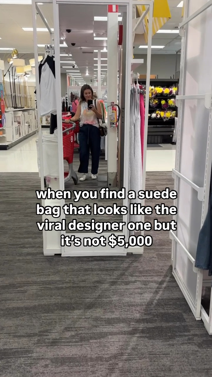 The Row Margaux Bag dupe at Target! Why spend $5,000 on a designer suede bag when you can find a stylish alternative for a fraction of the price? This suede bag from The Row is going viral as the bag of the season but you can get the look from Target for just $35. 🎯

Ditch the hefty price tag and discover how to elevate your wardrobe with affordable fashion that doesn't compromise on quality. Your perfect statement piece is out there—without the designer cost! 👏🏻 #targetstyle #targetfashion #targetfinds

#LTKFindsUnder50 #LTKItBag #LTKStyleTip